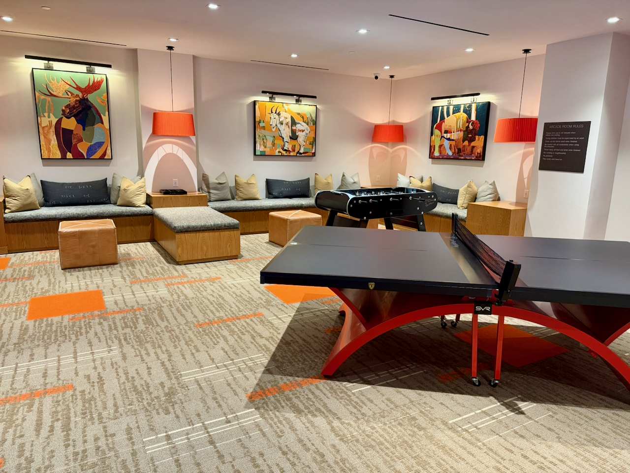 Teen game room with foosball, ping pong, and more. 