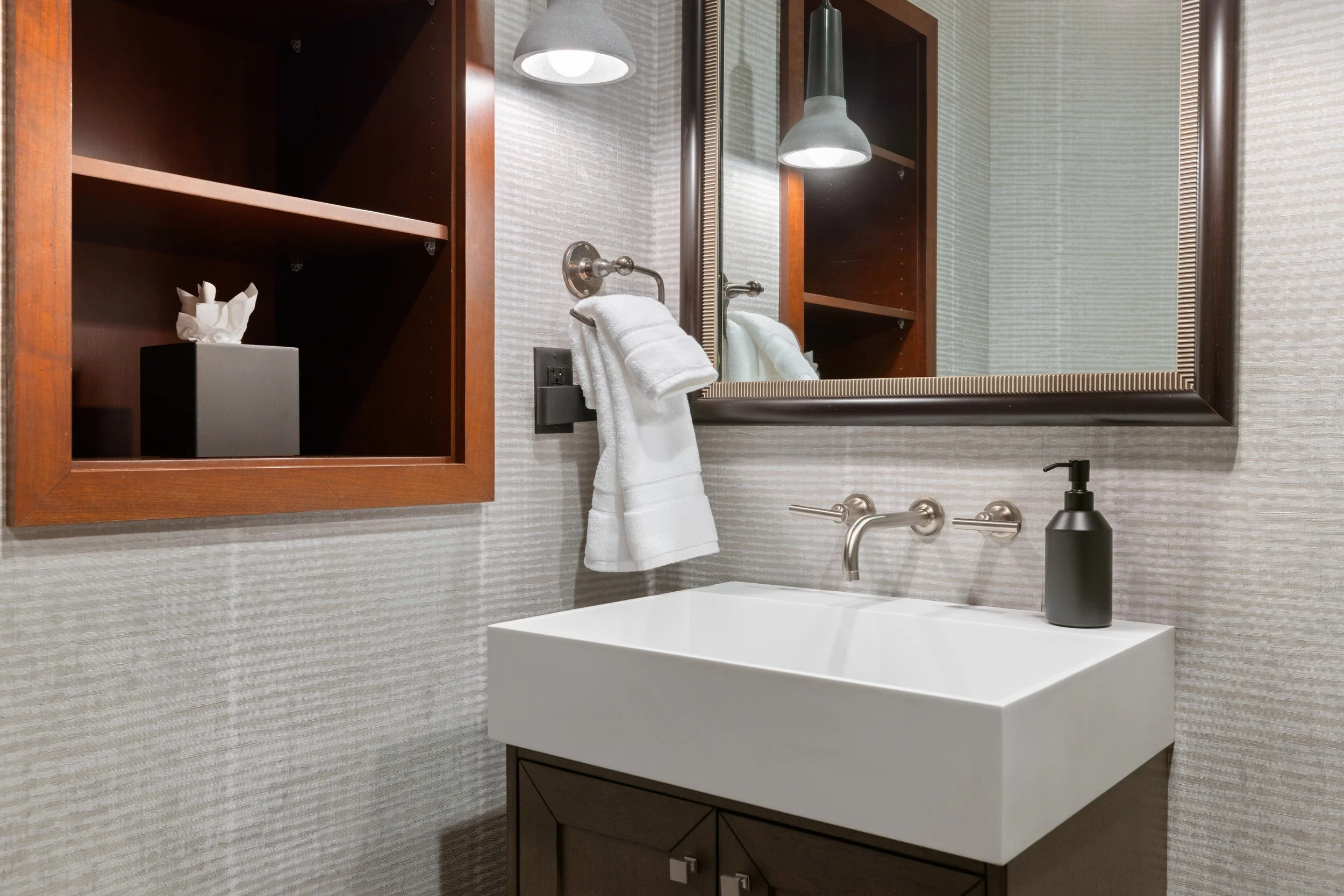 Entry powder room with vessel sink and designer finishes