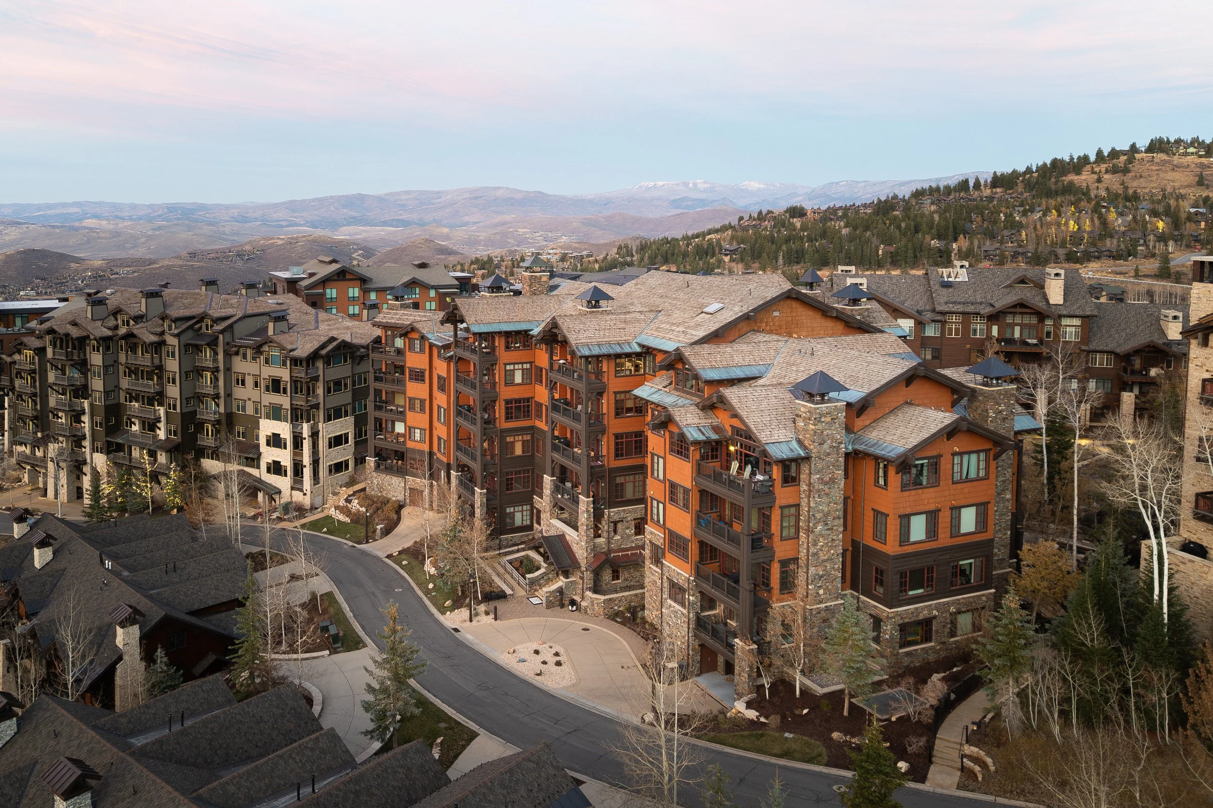 Aerial view of Flagstaff Lodge in the heart of Empire Pass at twilight