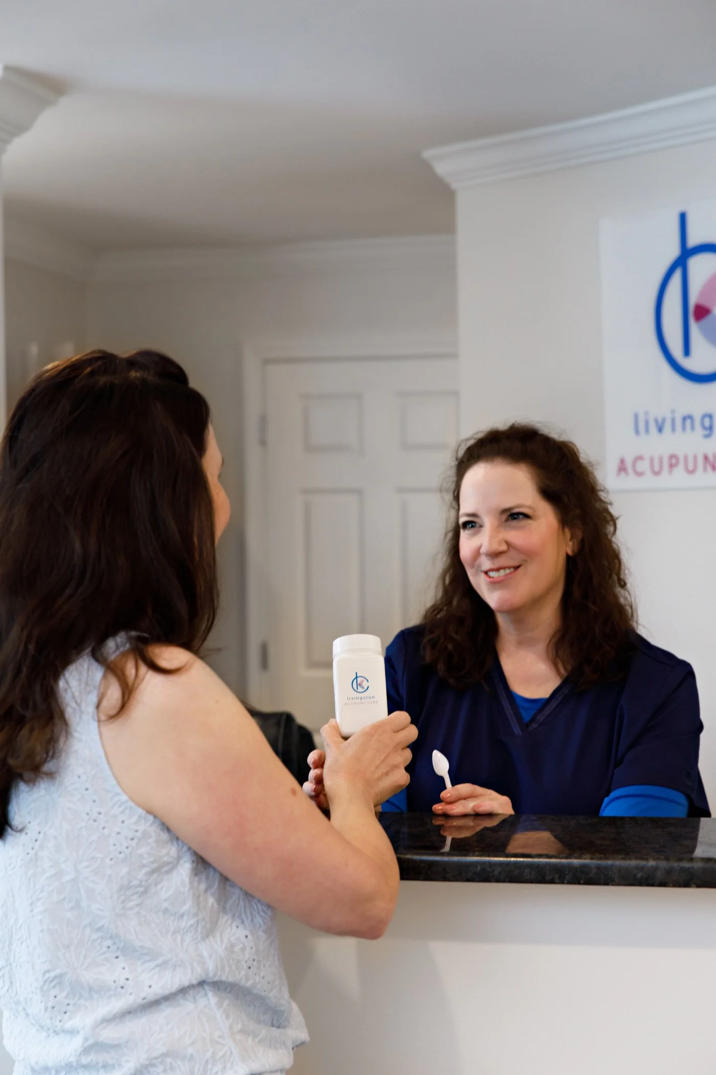 Livingston Acupuncture front desk patient checking out-102.jpg