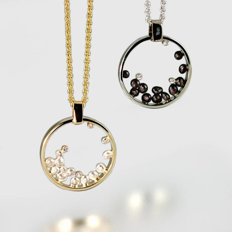 pebble pendants in circlecorrected.jpg