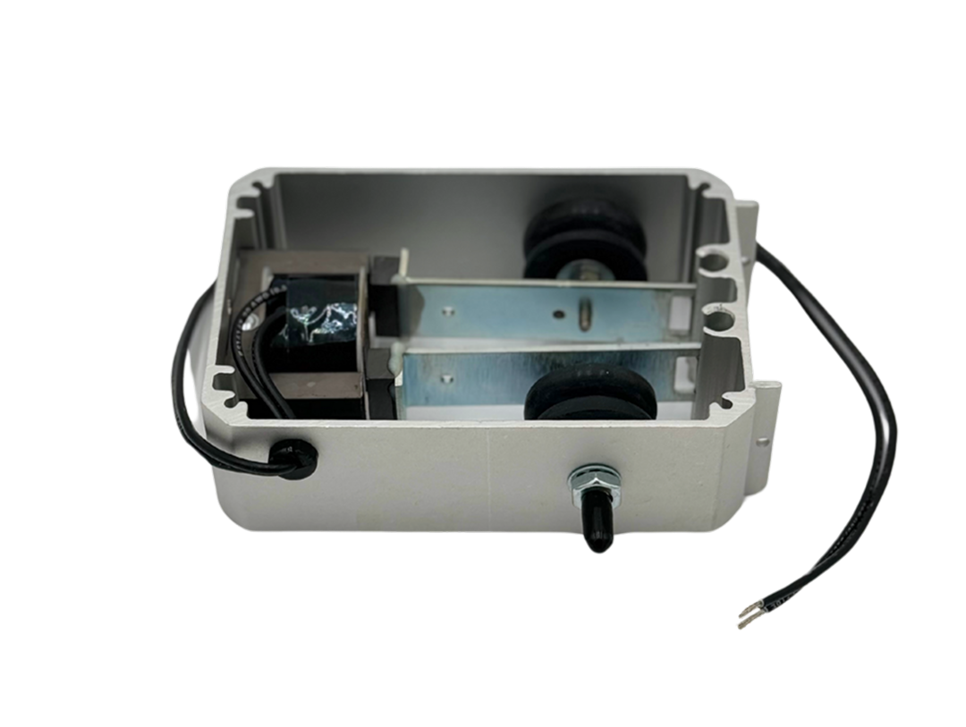 An empty metal electrical box with black wiring and internal components inside.