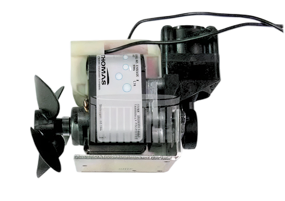 A small boat engine with an exposed propeller and wiring against a black background.