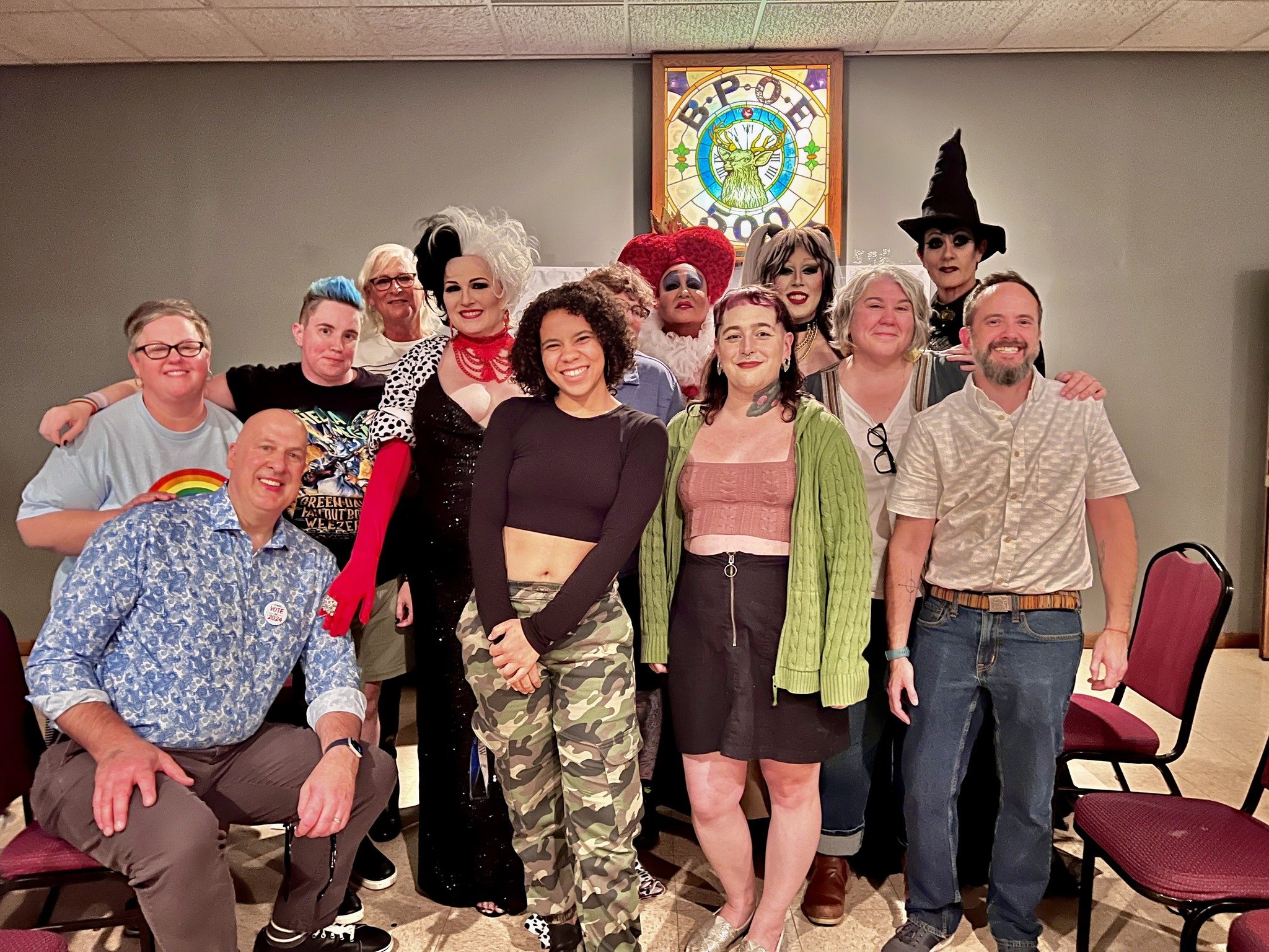 LGBTQ Outreach Board members posing with Drag Queens at our annual drag show