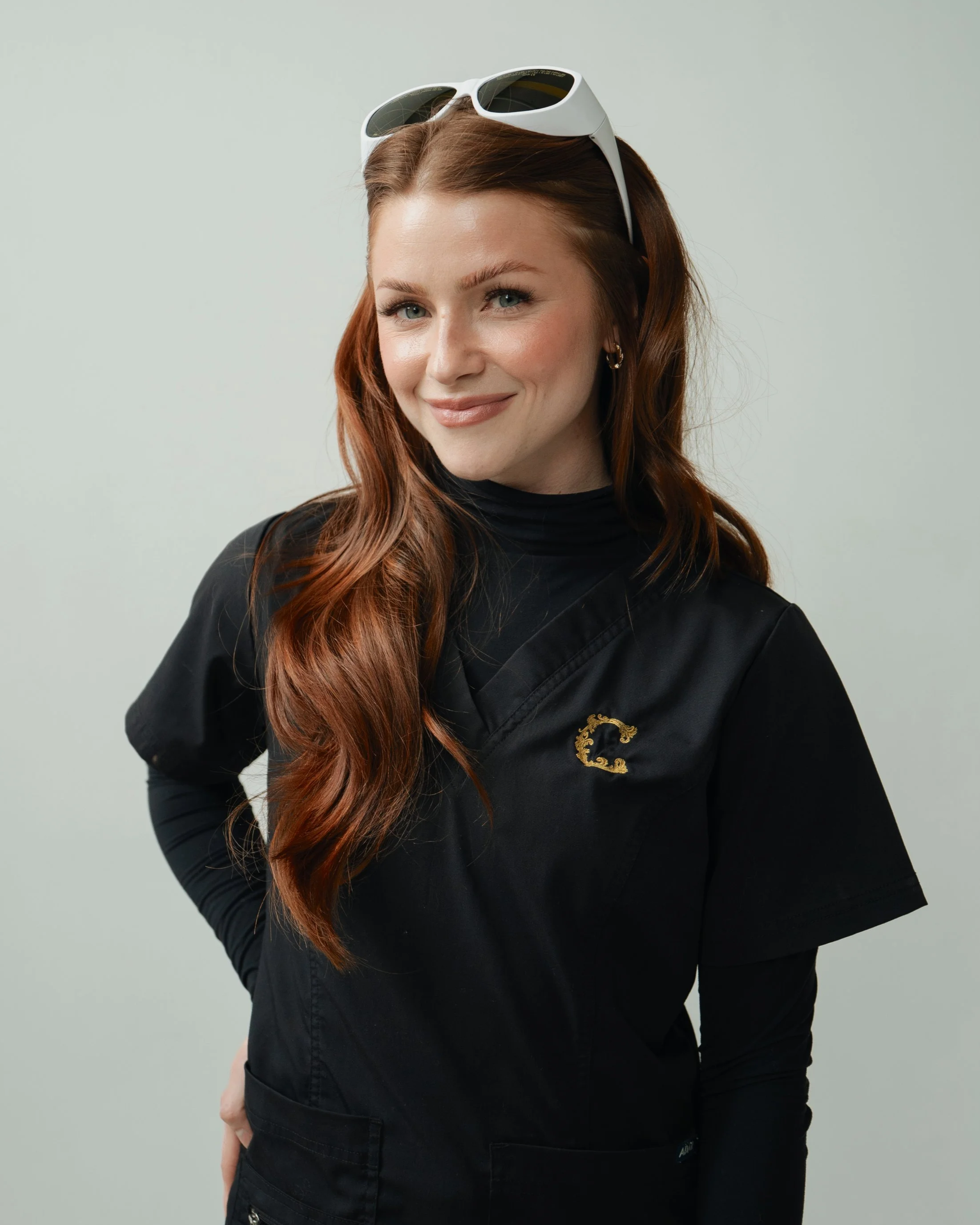 An advanced laser tattoo removal technician removing a tattoo in minimal sessions with the Candela Picoway Laser, the gold standard for tattoo removal and the best equipment in the country at Chariot Tattoo & Removal in Boise, Idaho. 