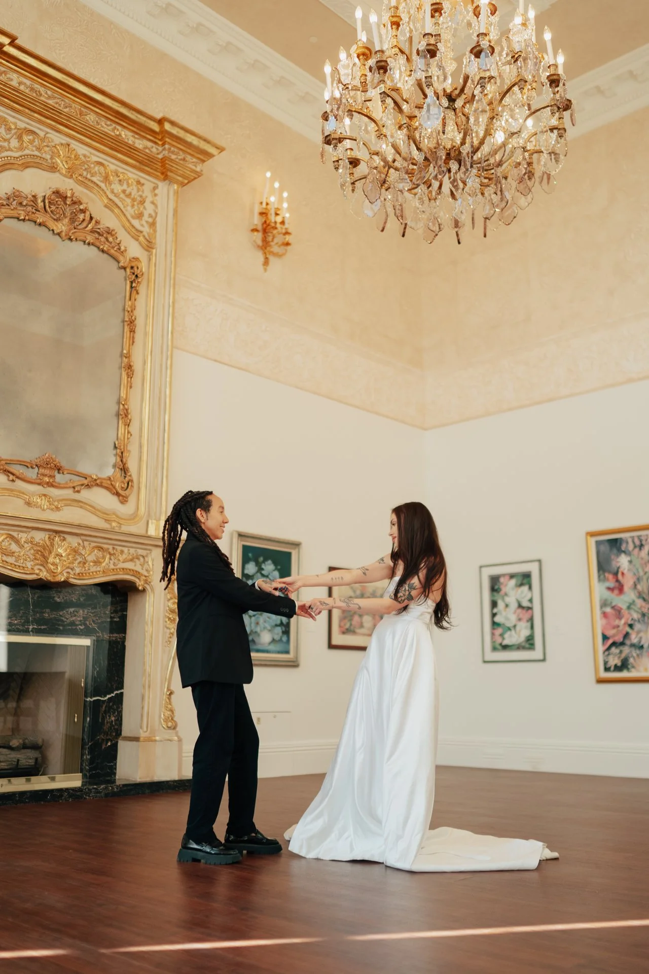 two brides celebrate their love in an ornate museum of art - poise and ivy imagery