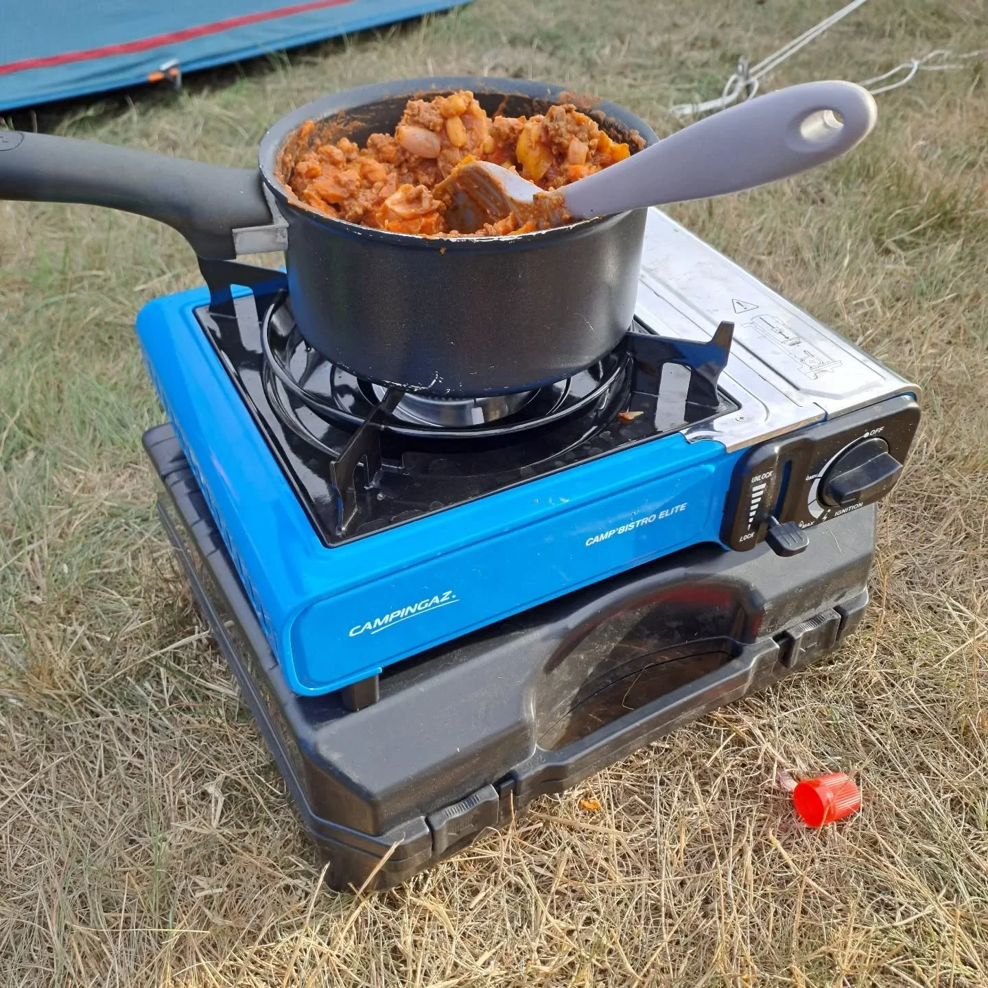 Burritos and crumble for nine? On it. 

Starting @greenbeltfestival right 😊

#Greenbelt #pilgrimage #campingandcrumble #festivalandfeast #pilgrimandpup 

[Image descriptions: 1) a saucepan on a capstone, piled high with chilli. 2) tasty looking side