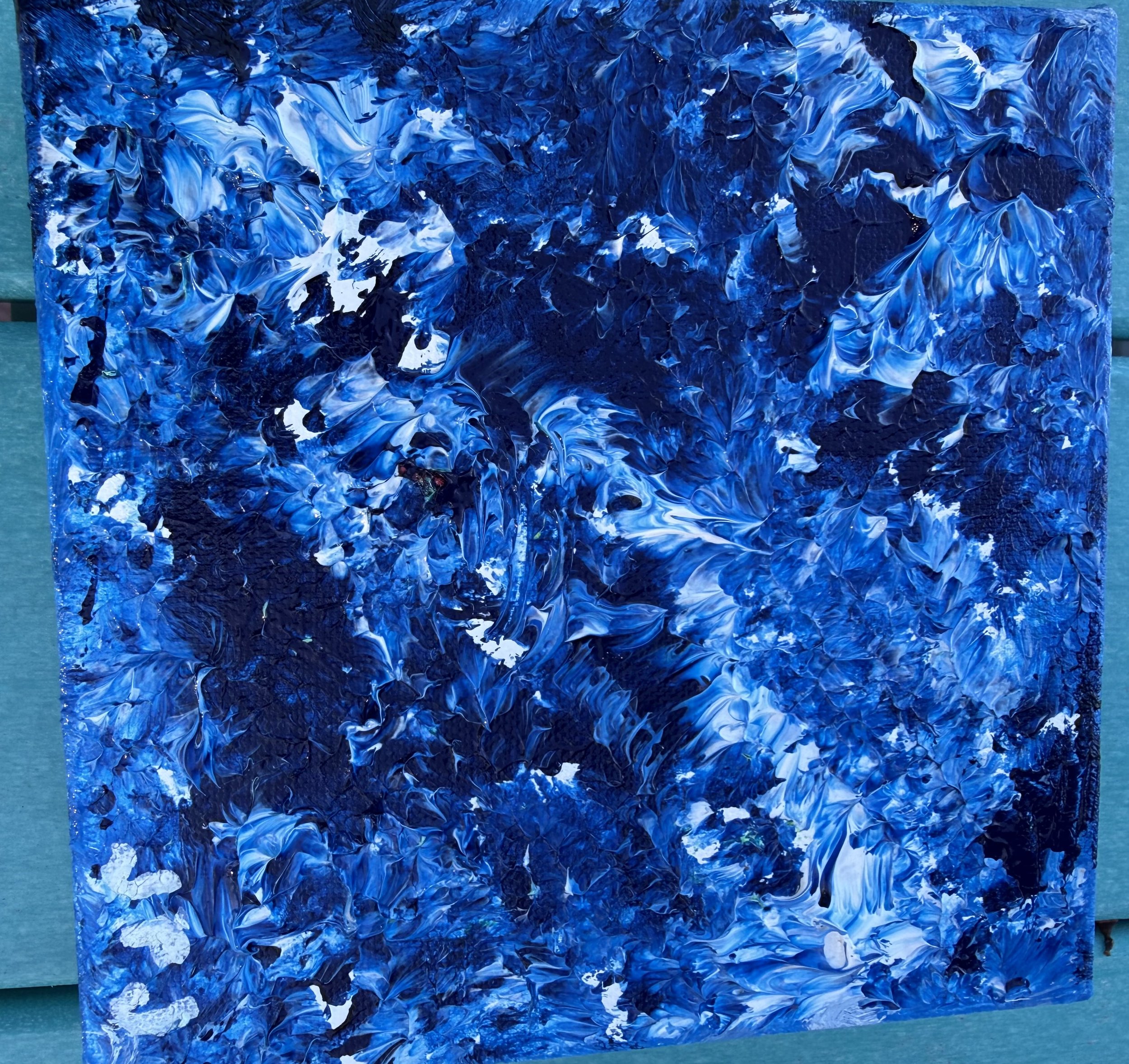 Judi Jones; Ocean Drops; Acrylic; The ocean invites reflections as the surf intermingles with the deep blue sea.; $150