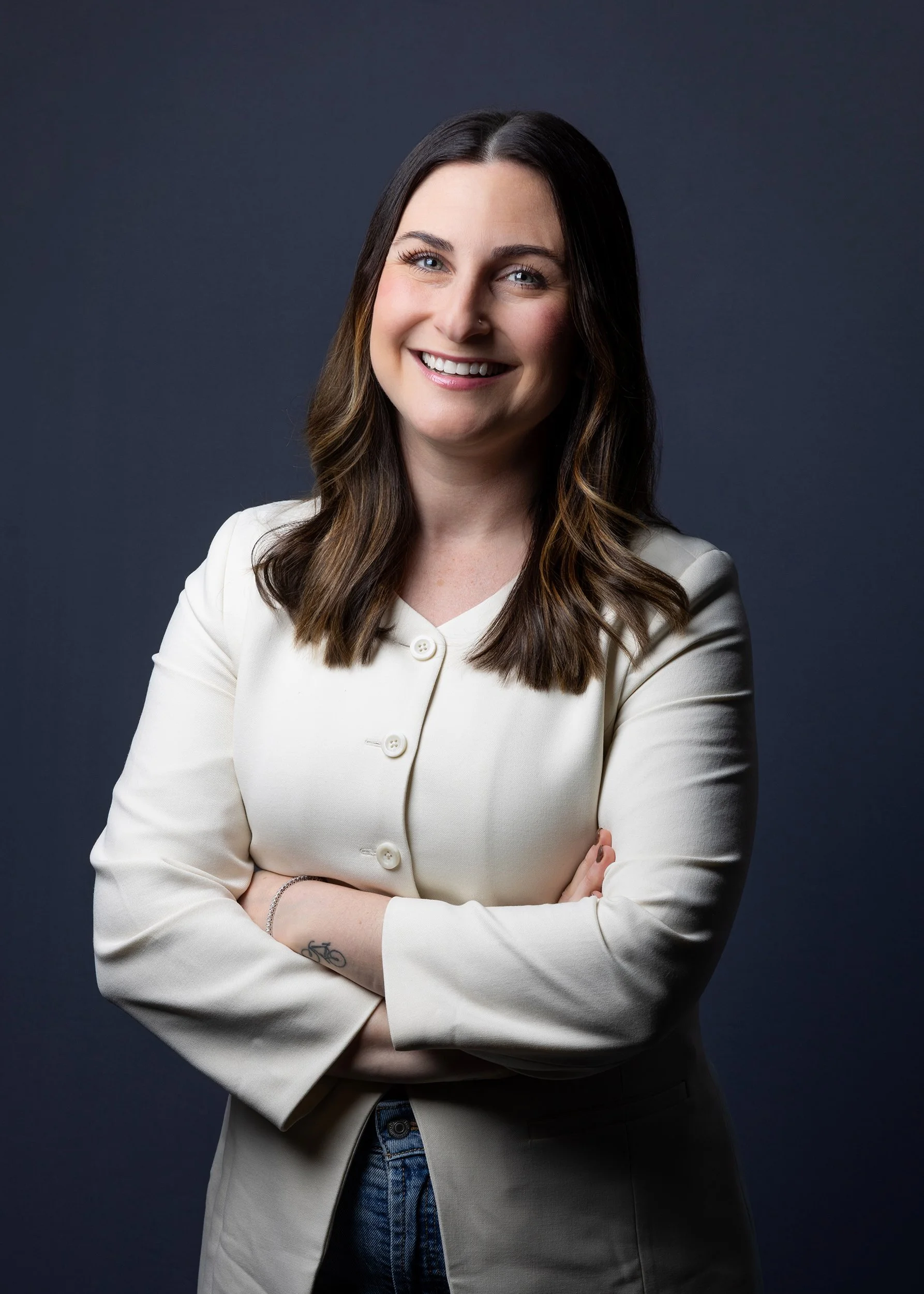 Portrait of woman in white blazer