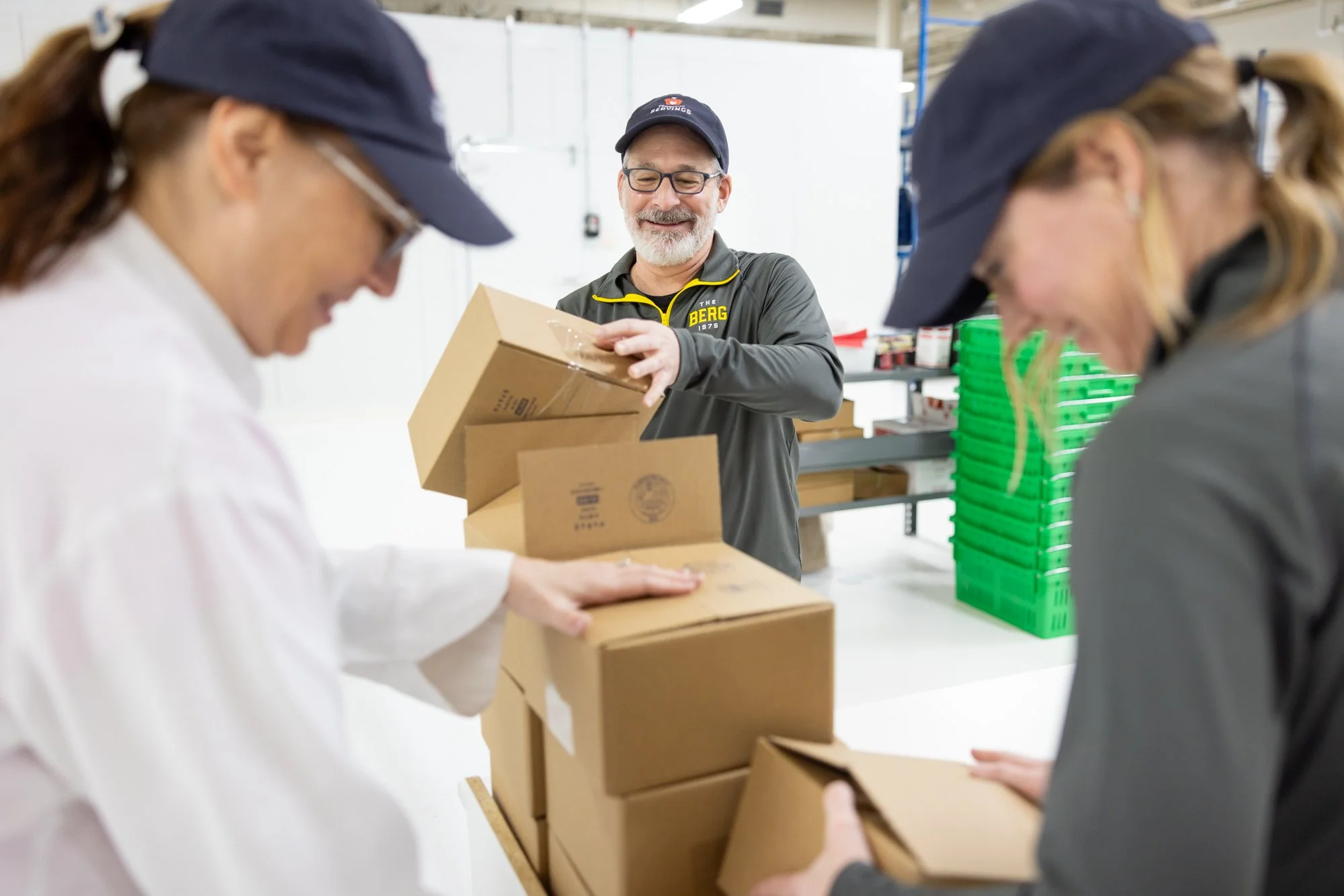 Group of people packing boxes