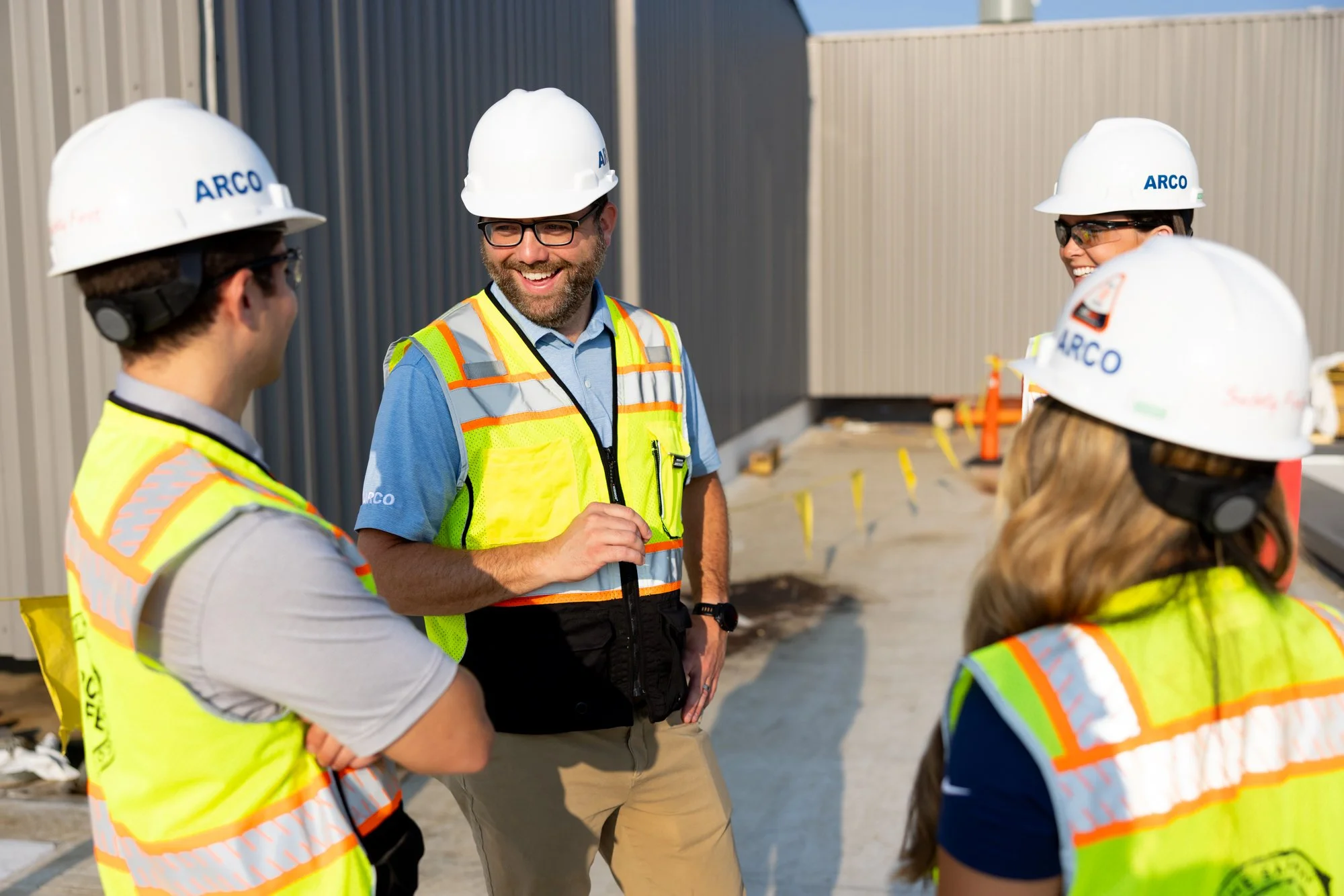 Group of workers laughing
