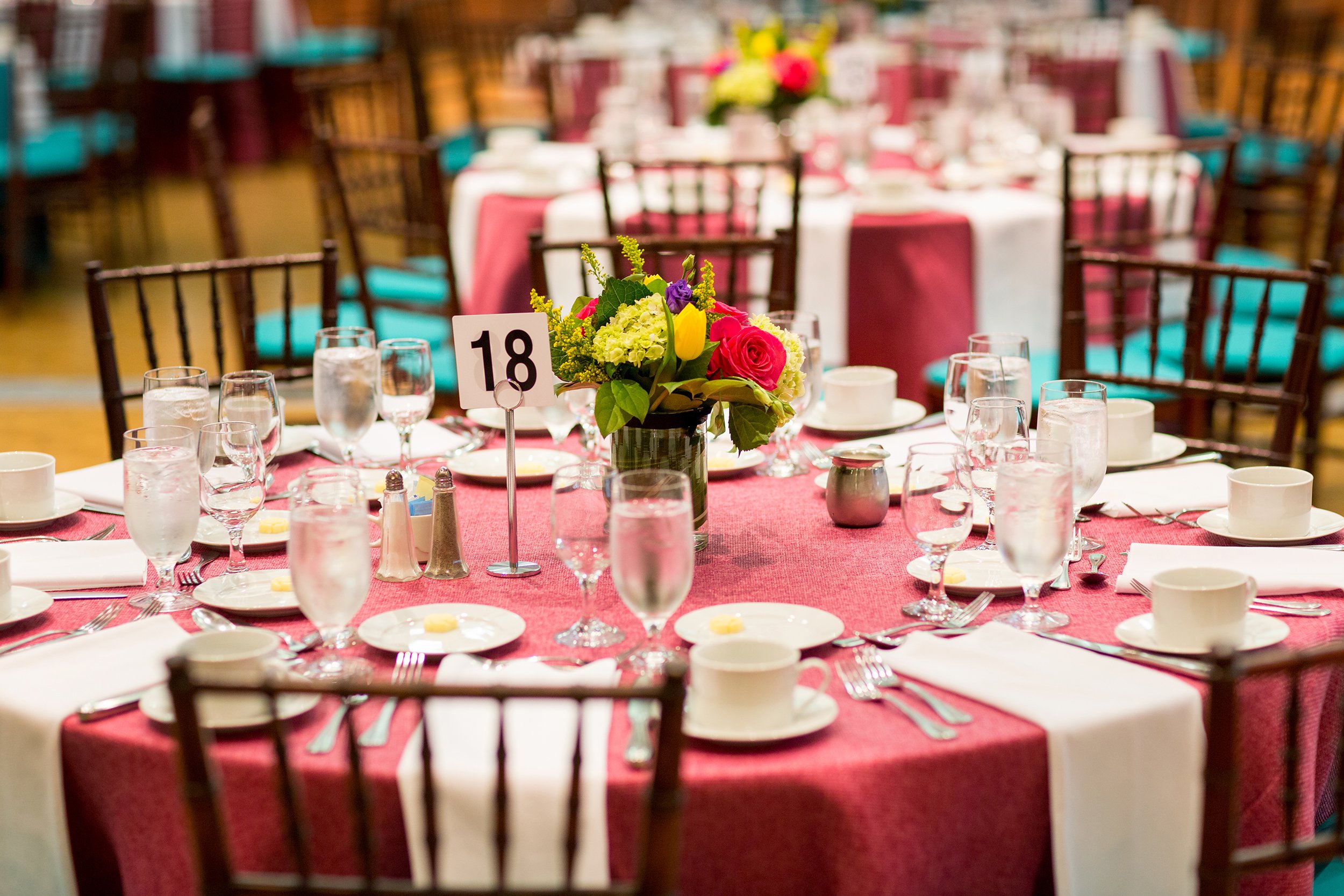 Table setup with flowers and dishes for event