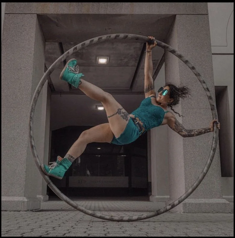 Alli Spins on Cyr Wheel