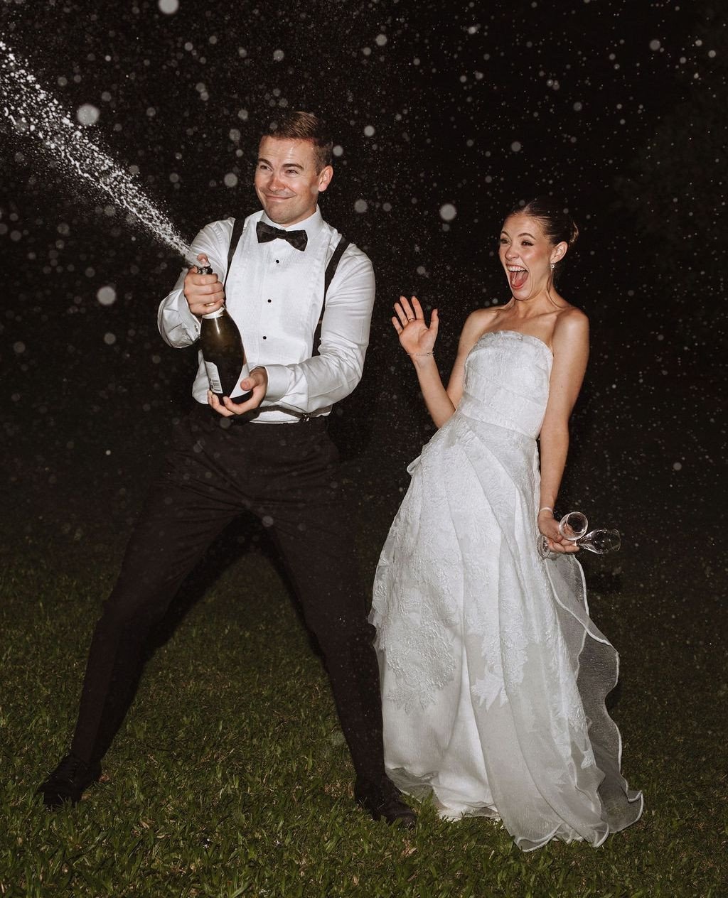 Spraying a little extra joy into the moment with Mr &amp; Mrs Oliver🍾⁠
⁠
Styling &amp; Stationery: @lovebirdweddings⁠
Venue: Private Property⁠
Florals: @_folea⁠
Photography: @margotestewartphoto⁠
Film: @frankie.films___⁠
Marquee: @sperrytents_sunshi