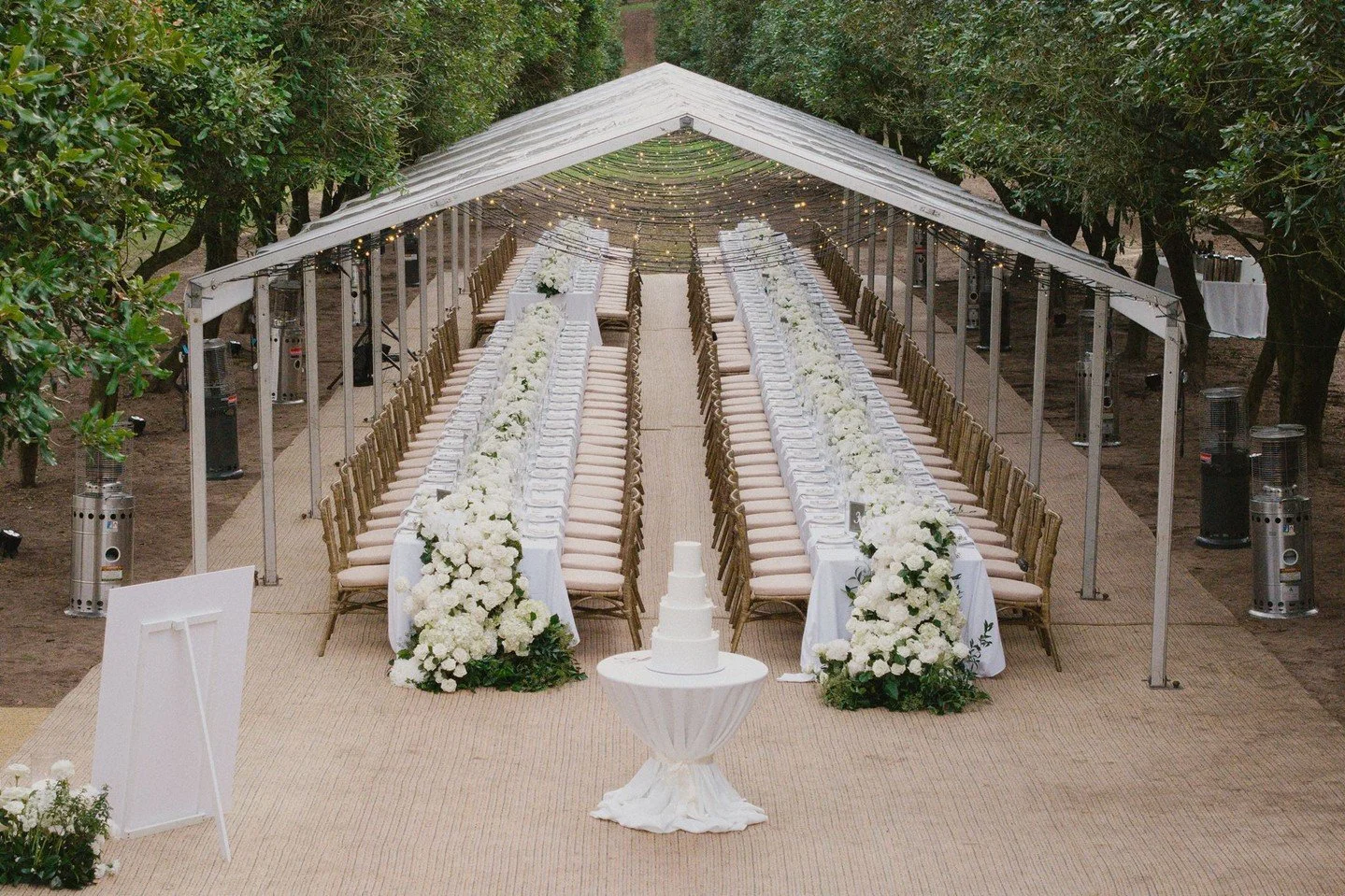 Beneath a canopy of light and starry skies, a marquee transformed into a world of understated luxury. Refined tablescapes, soft candlelight &amp; a celebration that unfolded timelessly for Phoebe &amp; Jack🥂⁠
⁠
Planning, Styling, Signage &amp; Stati