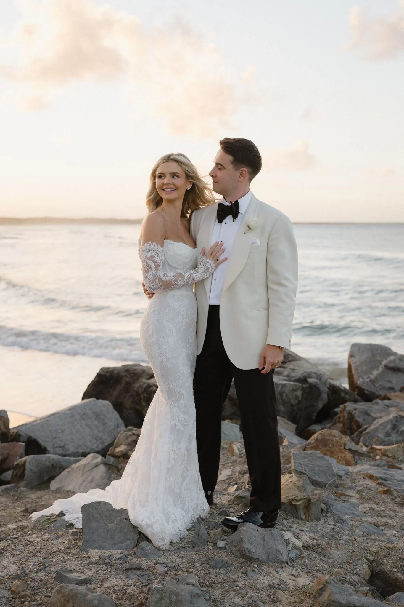 Discover a timeless white-on-white wedding at Maison la Plage and Bistro C in Noosa. Elegant coastal styling, luxury wedding inspiration and bespoke design by Lovebird Weddings.