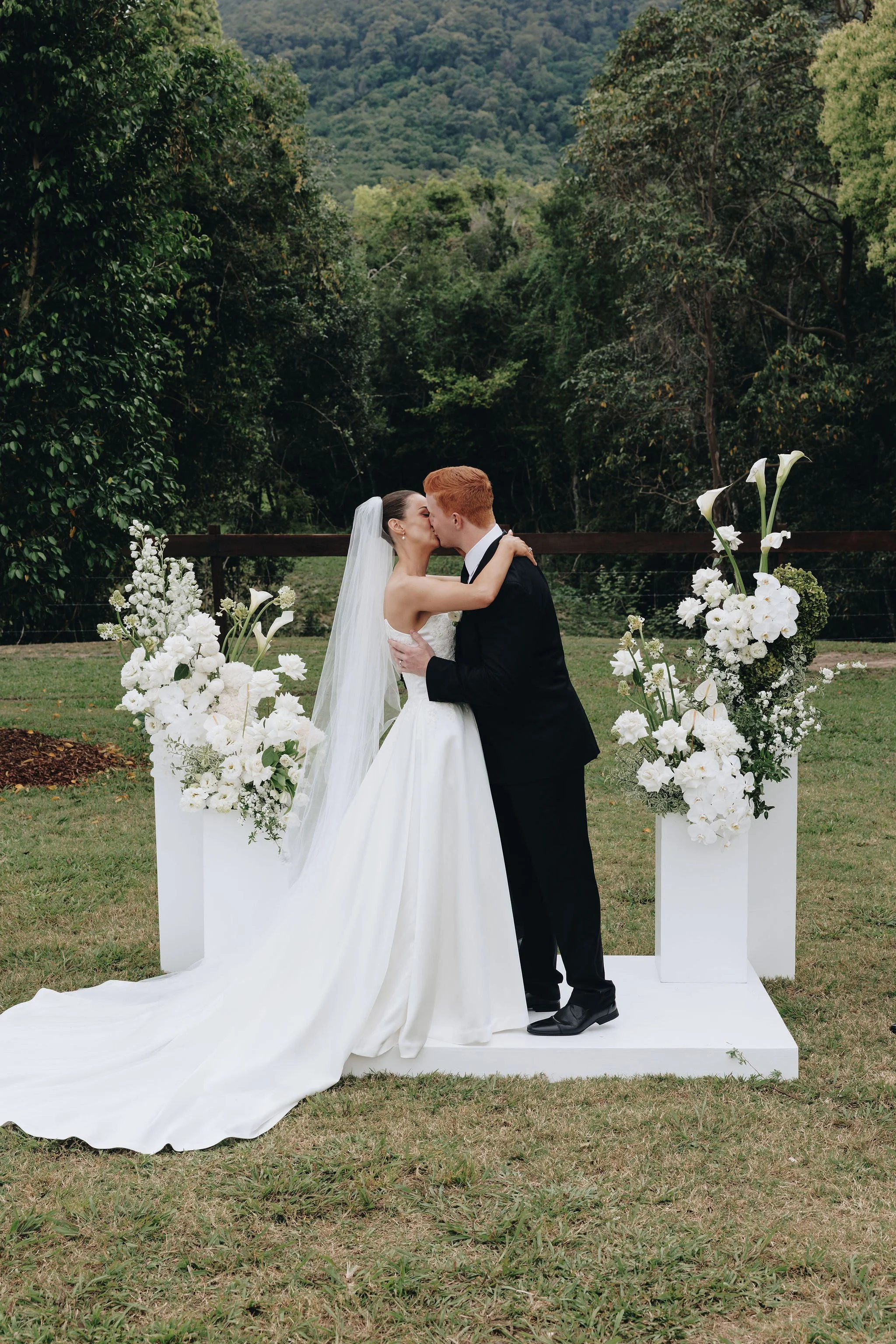Discover Pieter & Ethan's elegant wedding at Eerwah Vale Estate, featuring panoramic hinterland views, timeless styling and full wedding planning by Lovebird Weddings.
