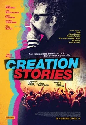 A movie poster for 'Creation Stories' featuring a black and white photo of a man with curly hair and sunglasses, with a crowd at a concert scene and colorful text elements.