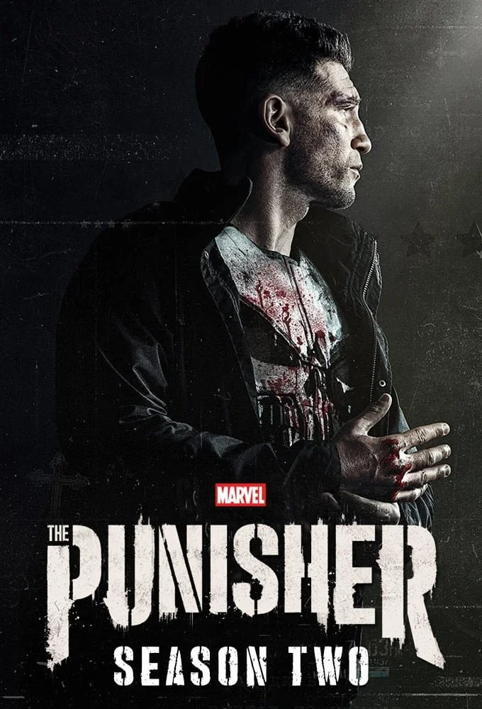 Poster for Marvel's The Punisher, Season Two, featuring a man with short dark hair, a dark jacket, and a bloodstained shirt, looking to the right, with a dark background and the title at the bottom.
