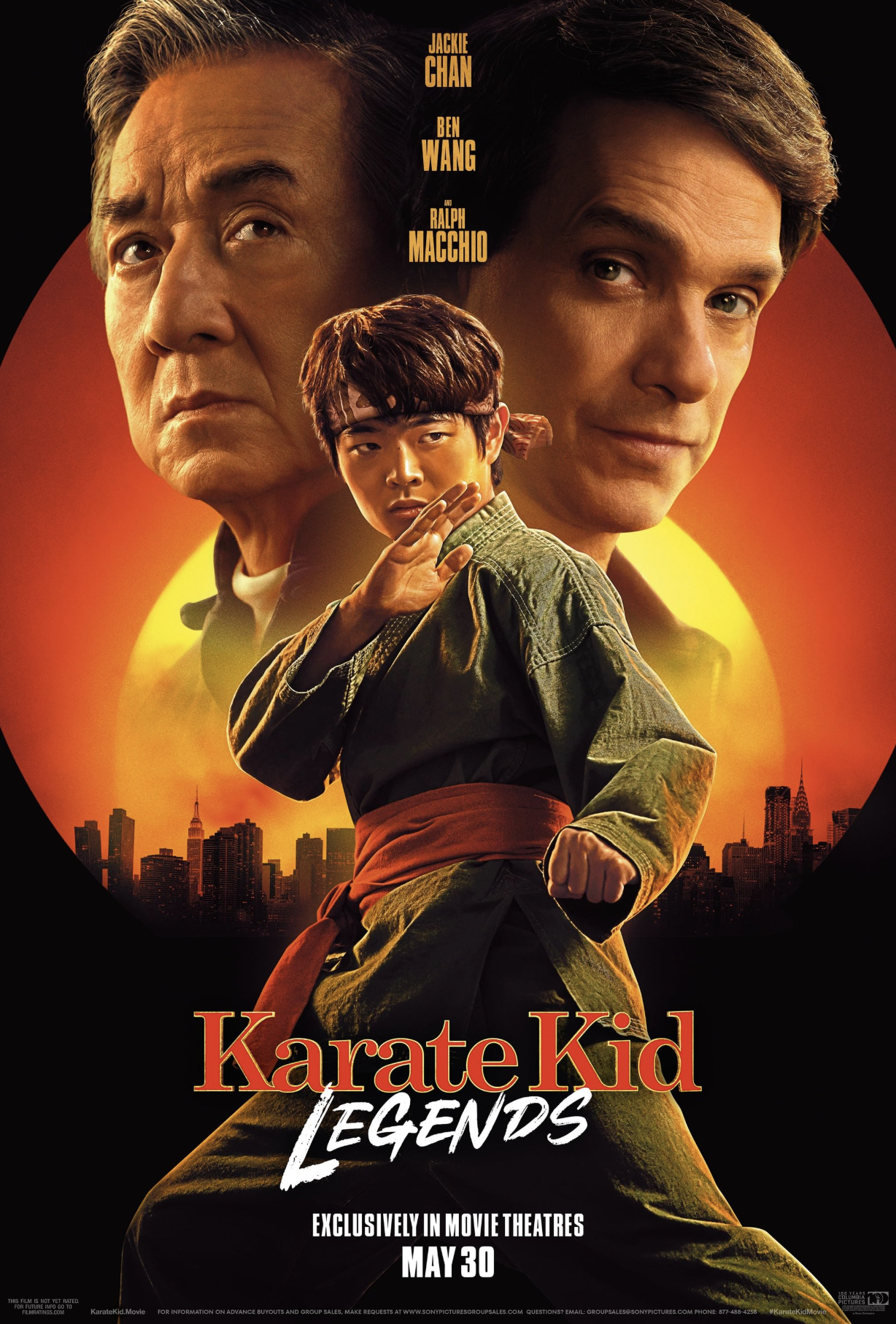 Movie poster for 'Karat Kid Legends' featuring actors Jackie Chan, Ben Wang, and Ralph Macchio, with a young karate student in a martial arts stance in front of a city skyline at sunset.