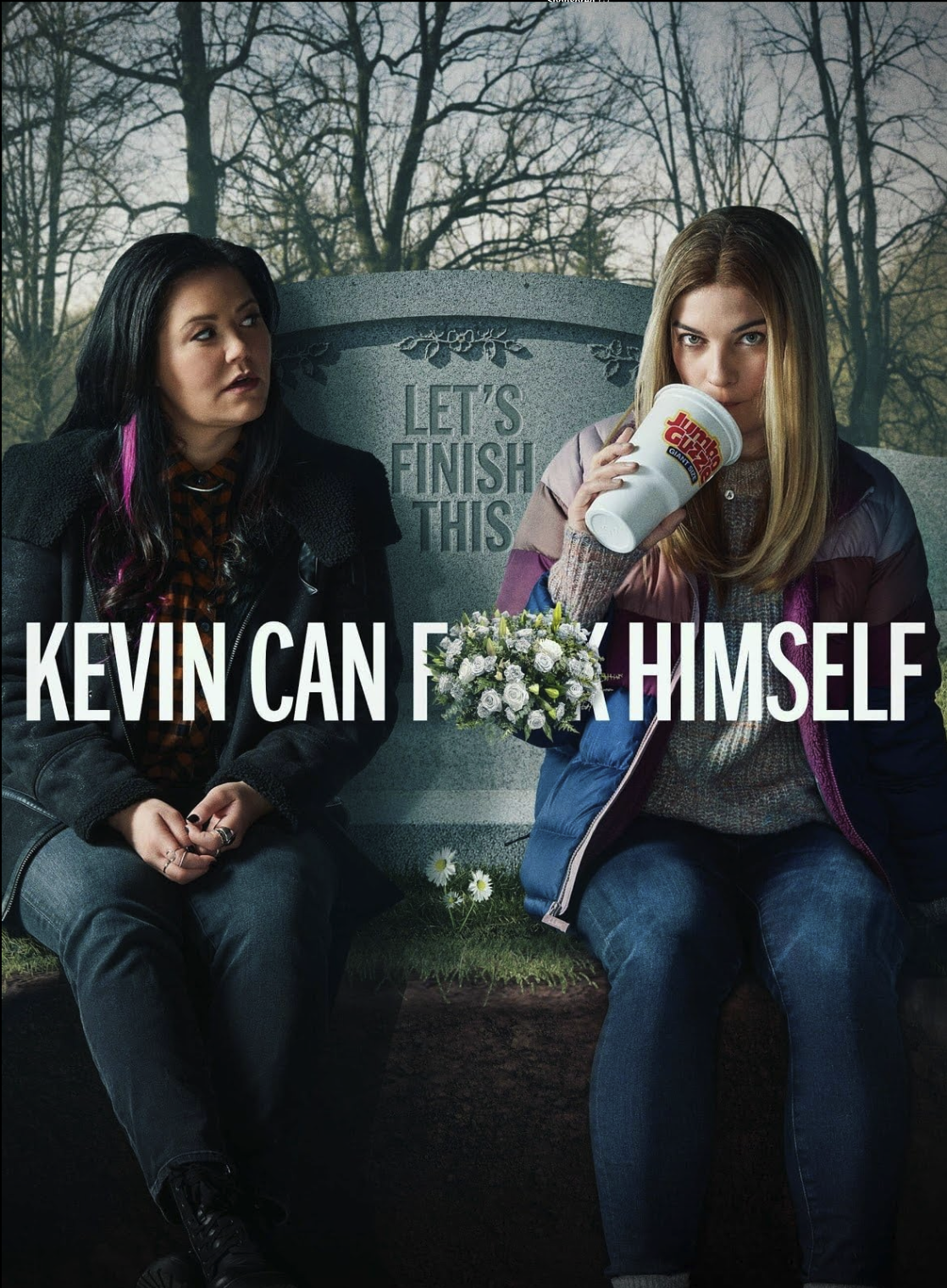Two women sitting on a bench at a graveyard with trees in the background. One woman is holding a giant burger and the other woman is holding a flower arrangement. Over the image, there is text that reads, "Kevin can f**k himself." Behind them is a he