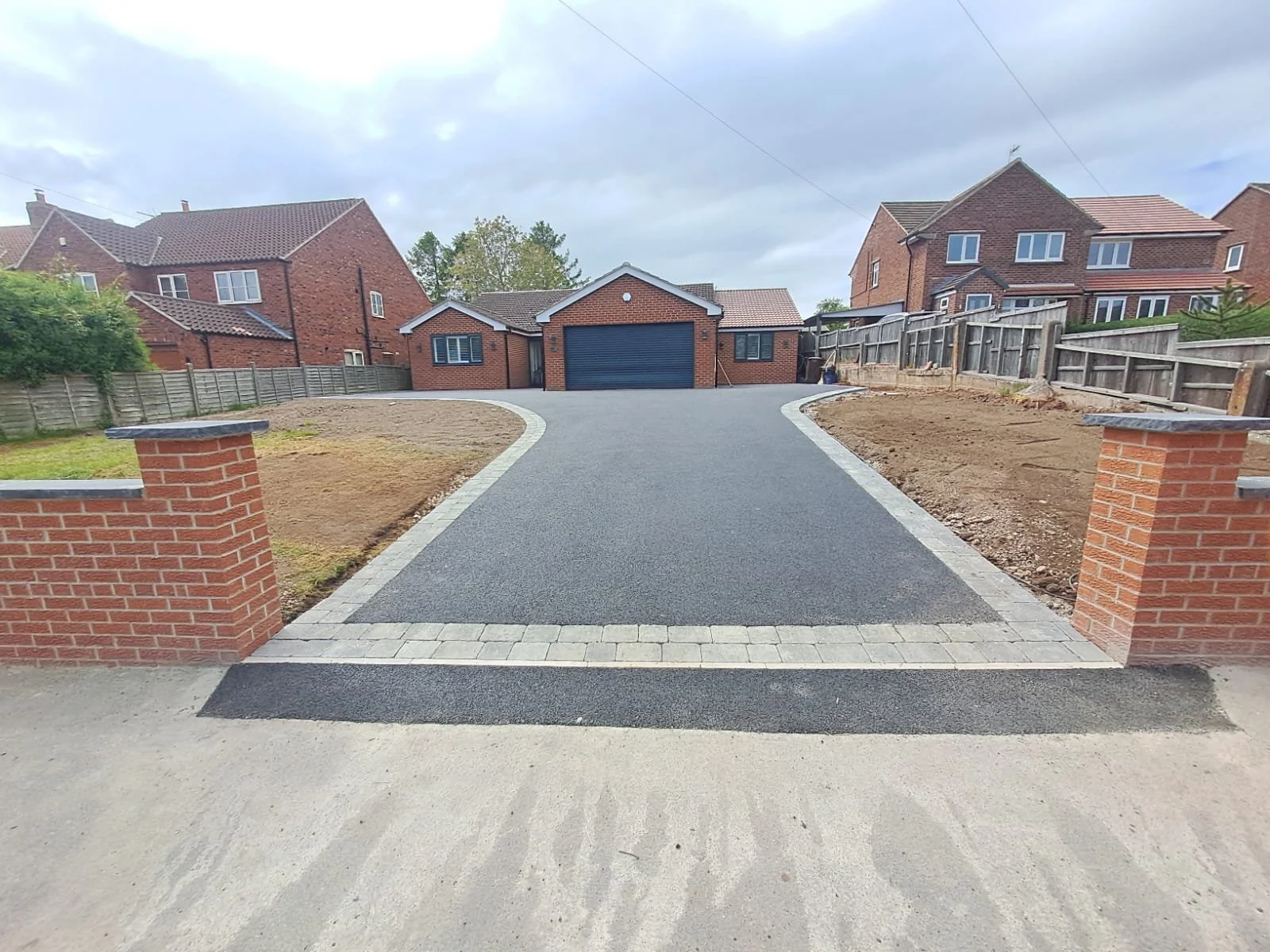 AFTER - newly laid driveway utilising tarmac and stone border by Perfecta Connect, Yorkshire