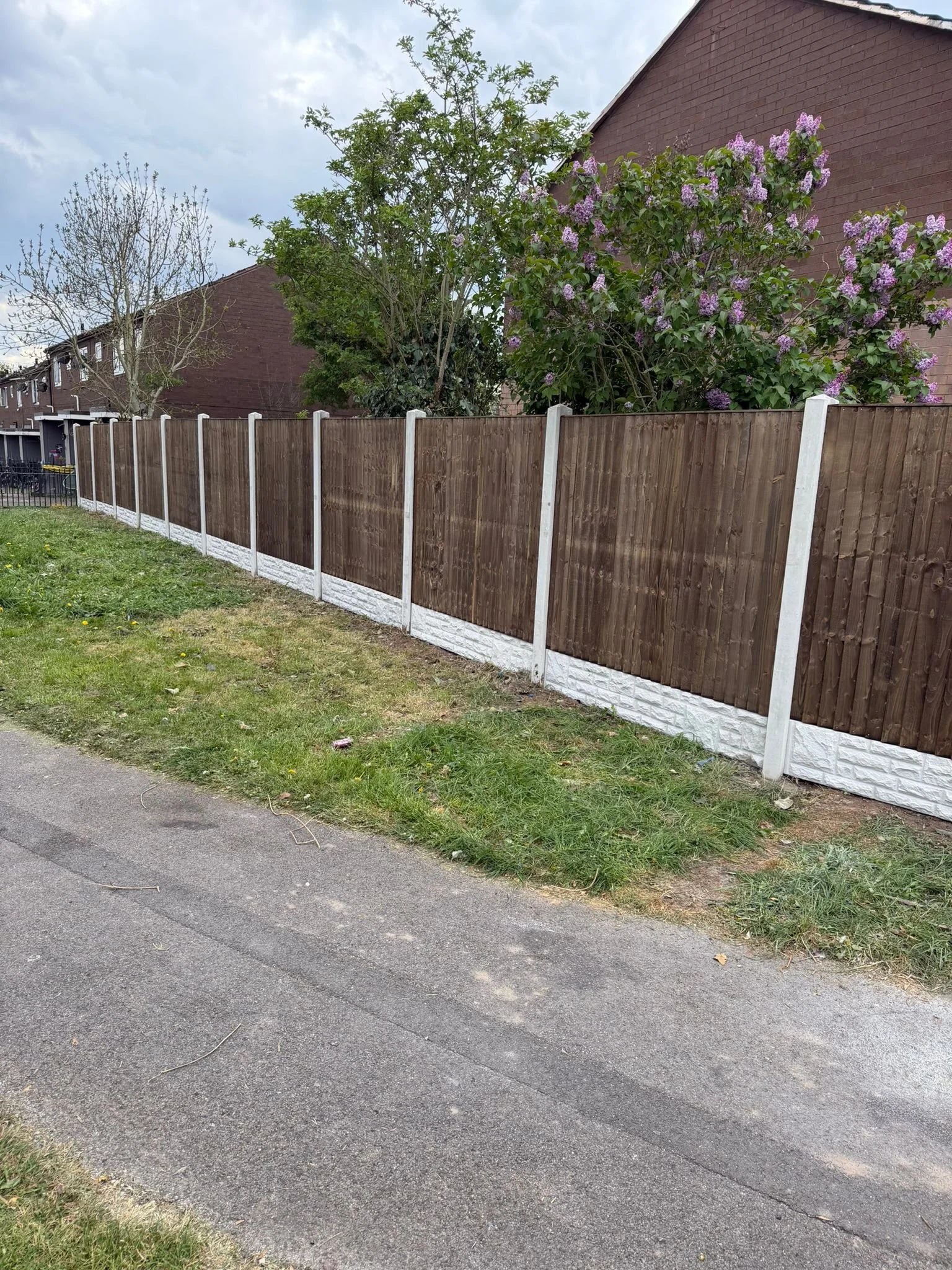 Repacement garden fencing installed with concrete base and panels by Perfecta Connect Wakefield