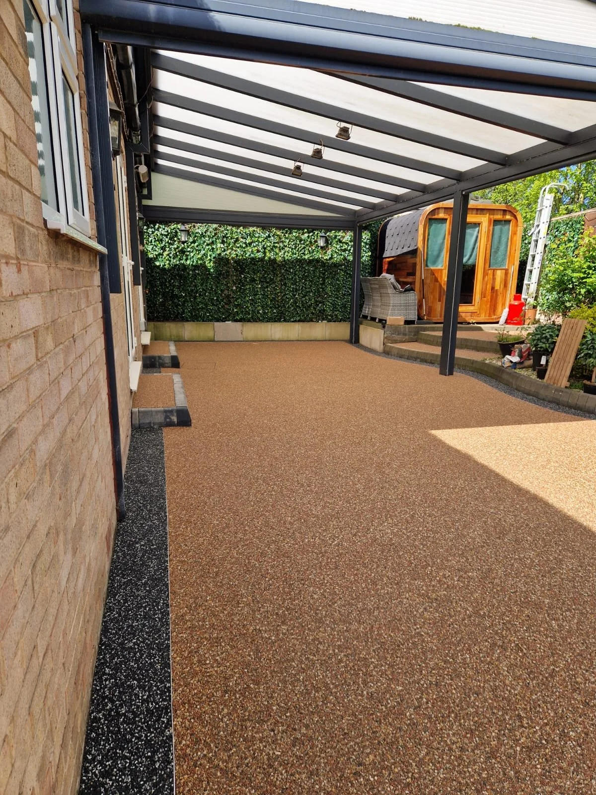 Polaris border and rose garden resin patio border installation by Perfecta Connect