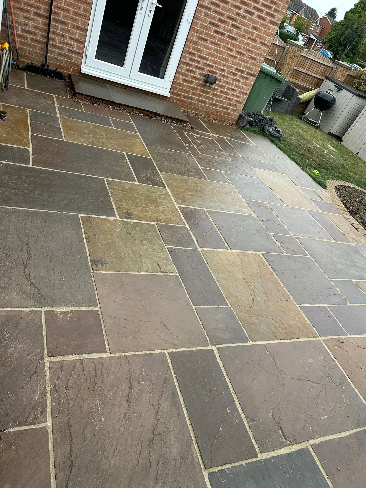 Close-up of Indian stone paving showing natural colour variation and finish