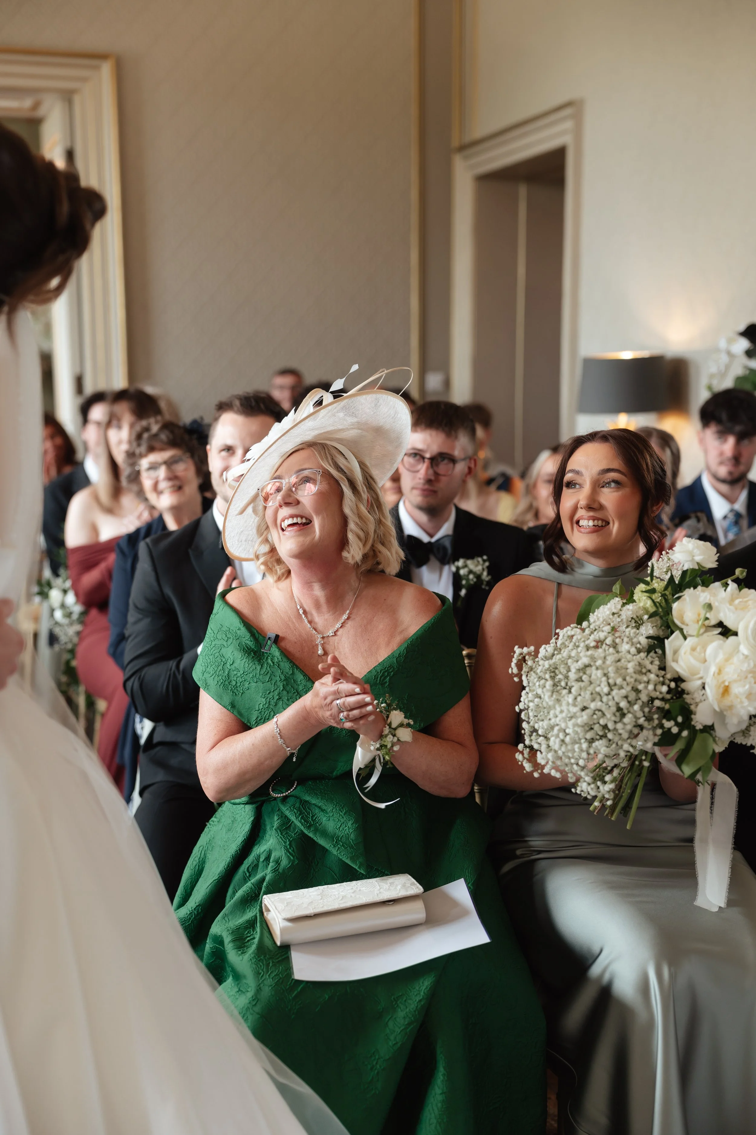 Mother of groom emotional glace during ceremony at Rise hall 