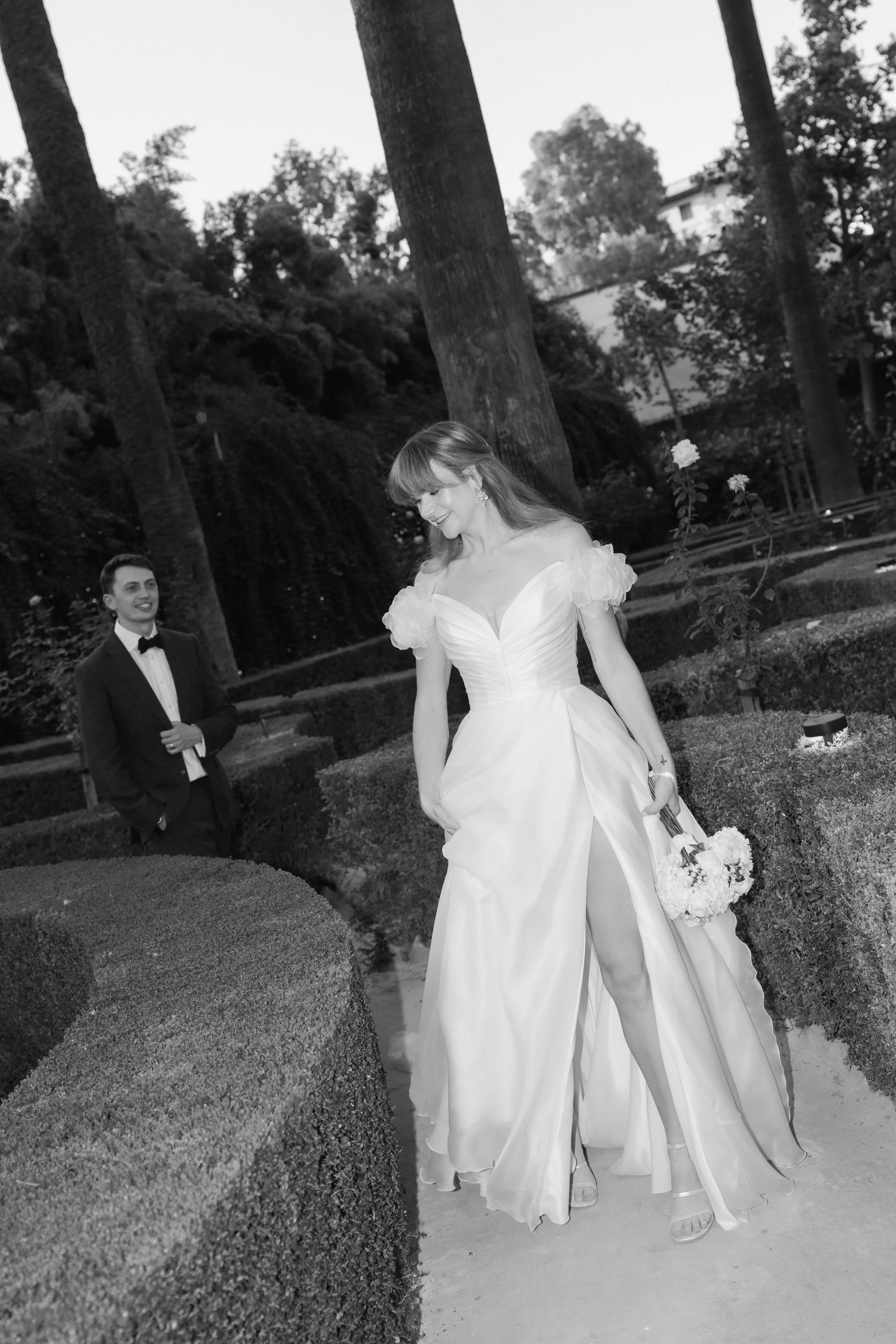 Outdoor wedding table with white and blush flowers and candles in Villa Luisa seville