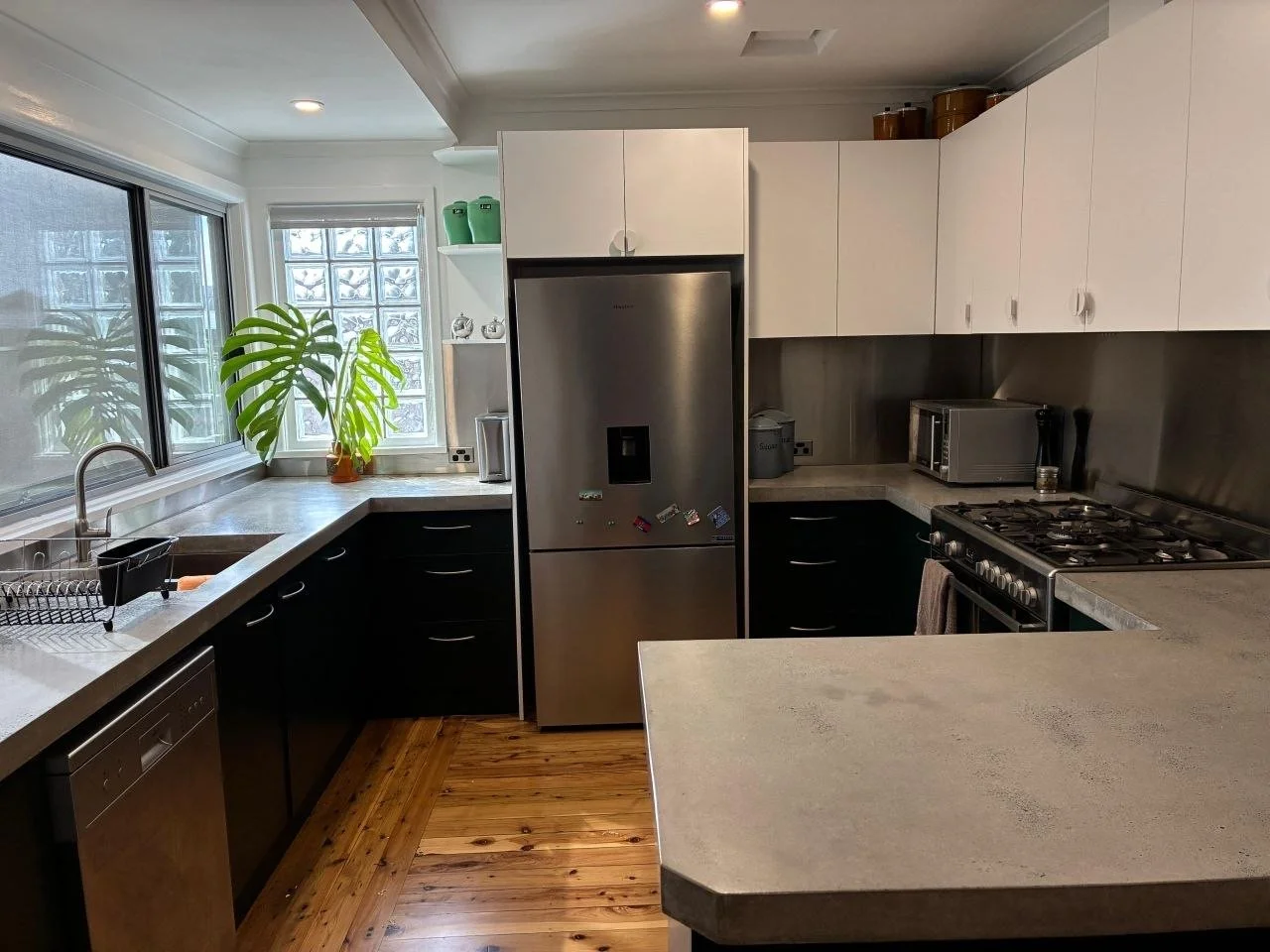 Concrete benchtops, Stainless splash backs