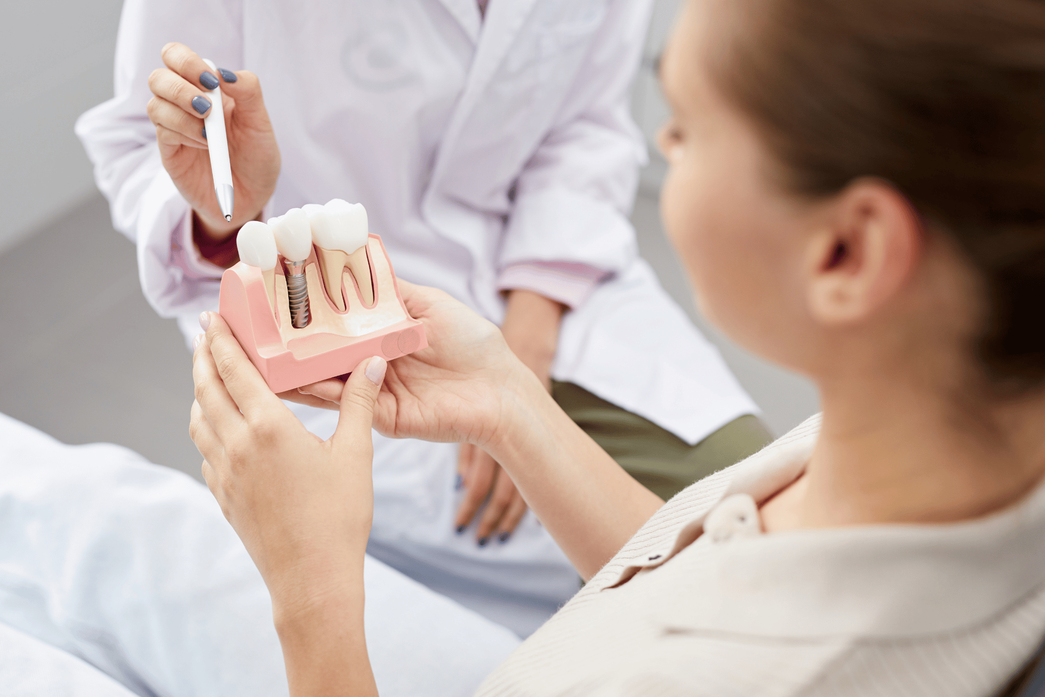 Pros and Cons of Dental Bridges vs. Implants