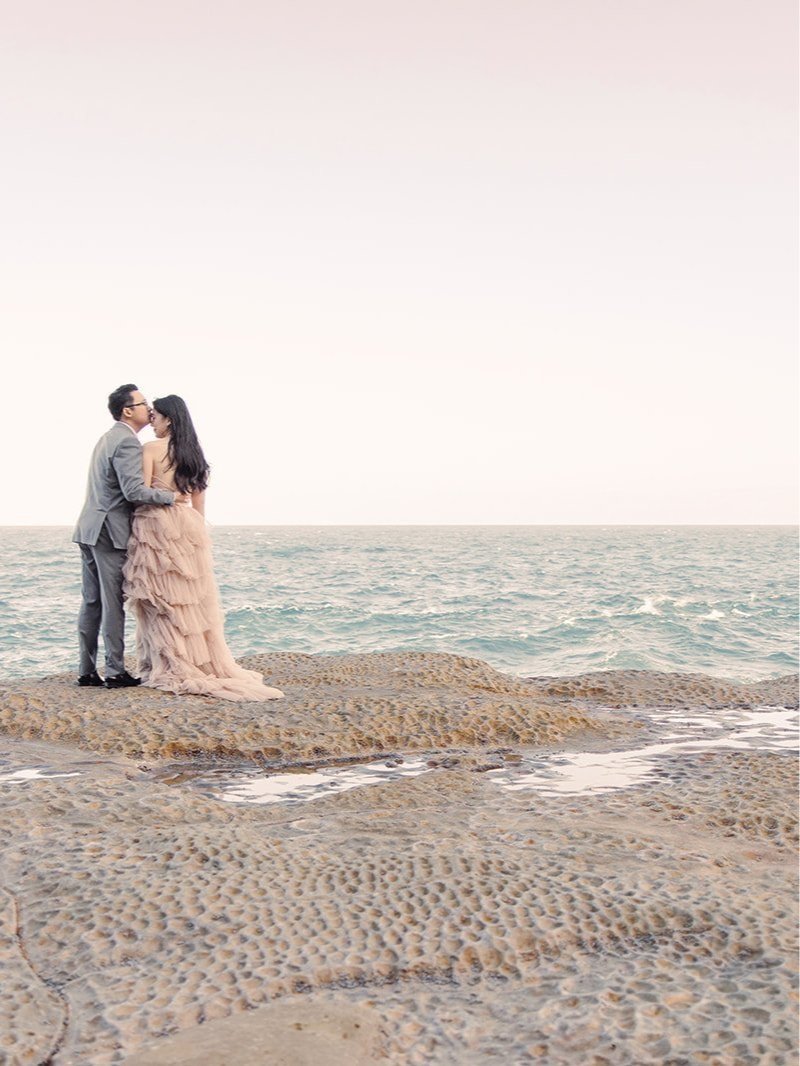 Newly engaged couple by the ocean in Sydney