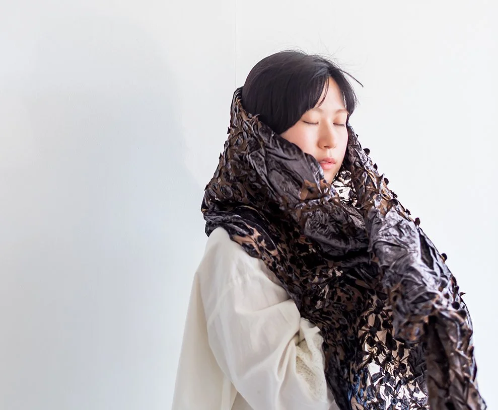 The Velvet Devore &amp; Shibori hand-pleated scarf at the new museum store.