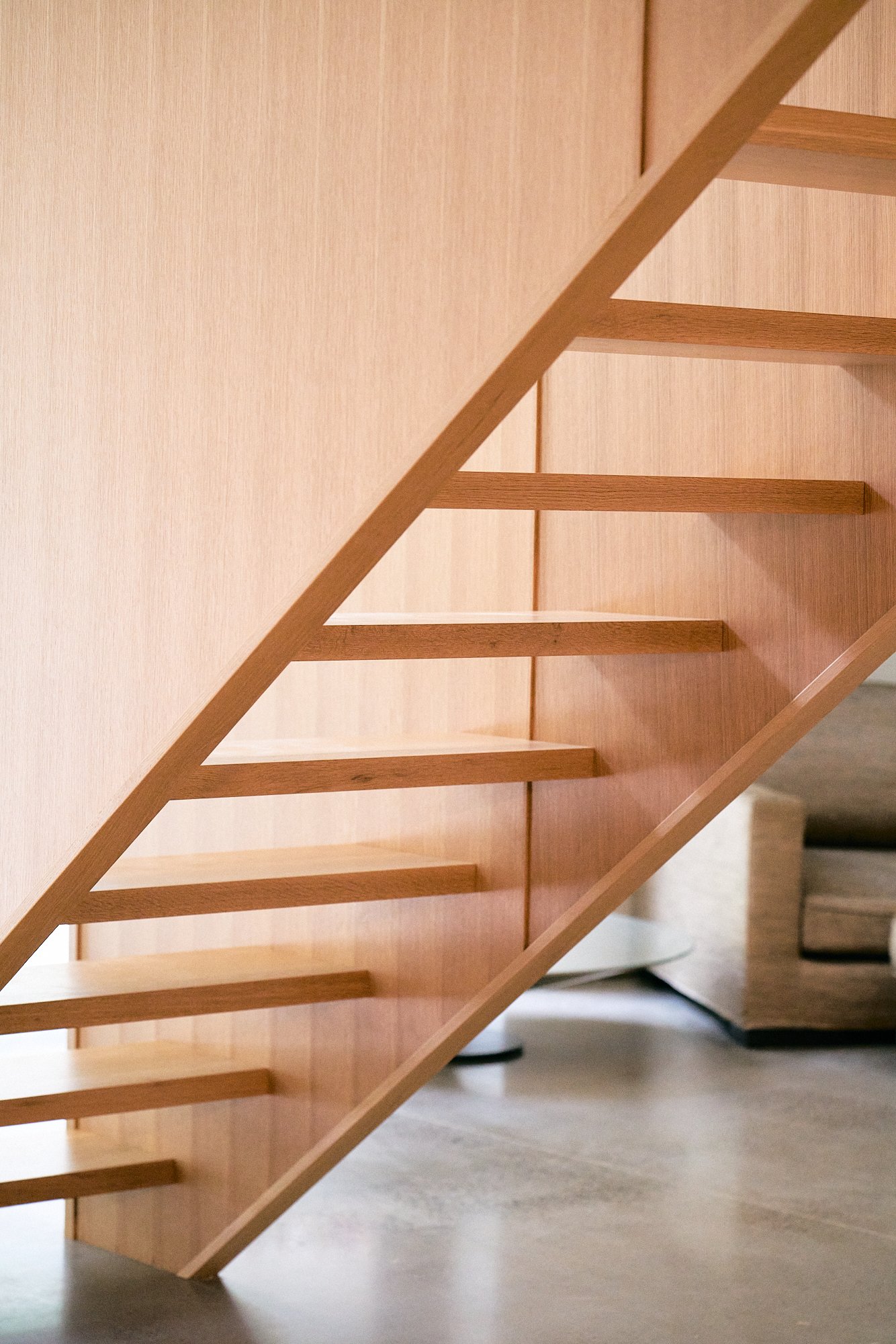 White oak staircase with open risers.