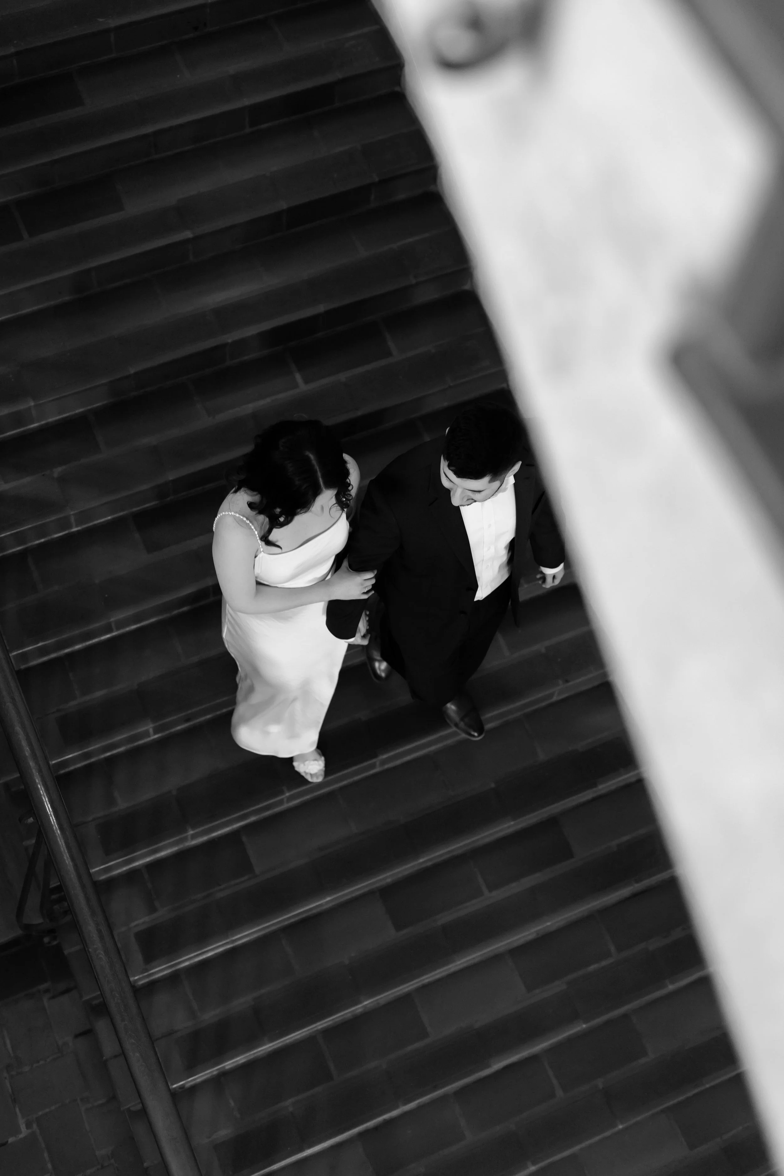 Romantic engagement photography at the Julia Ideson Building in Downtown Houston, capturing and elegant, elevated, and magical engagement photography session by Wild Ivy Creative Photography