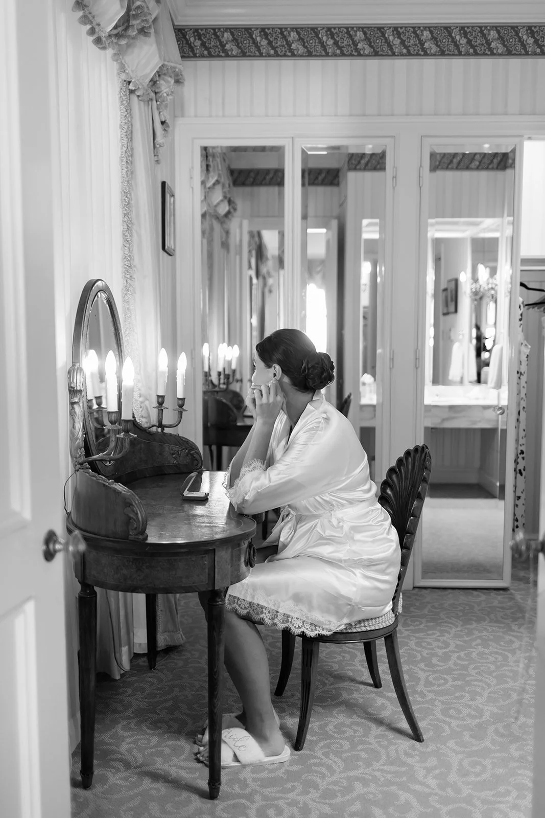 Bride getting ready in luxury Houston hotel suite, natural light pouring in – Houston wedding photographer – Wild Ivy Creative Photography