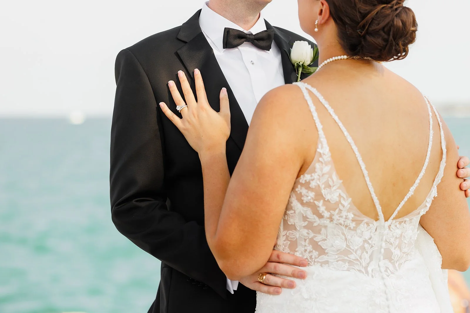 Bride and groom silhouette against city water – The Woodlands wedding photographer – Wild Ivy Creative Photography