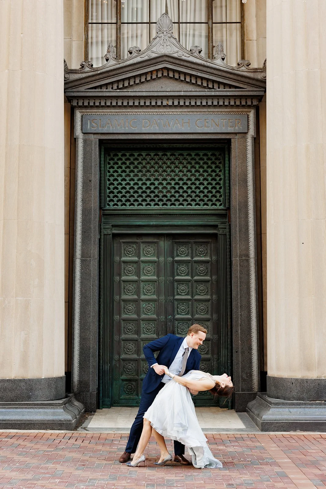 Elegant Houston engagement session with a couple dancing in front of the Islamic Dawah Center — Wild Ivy Creative.
