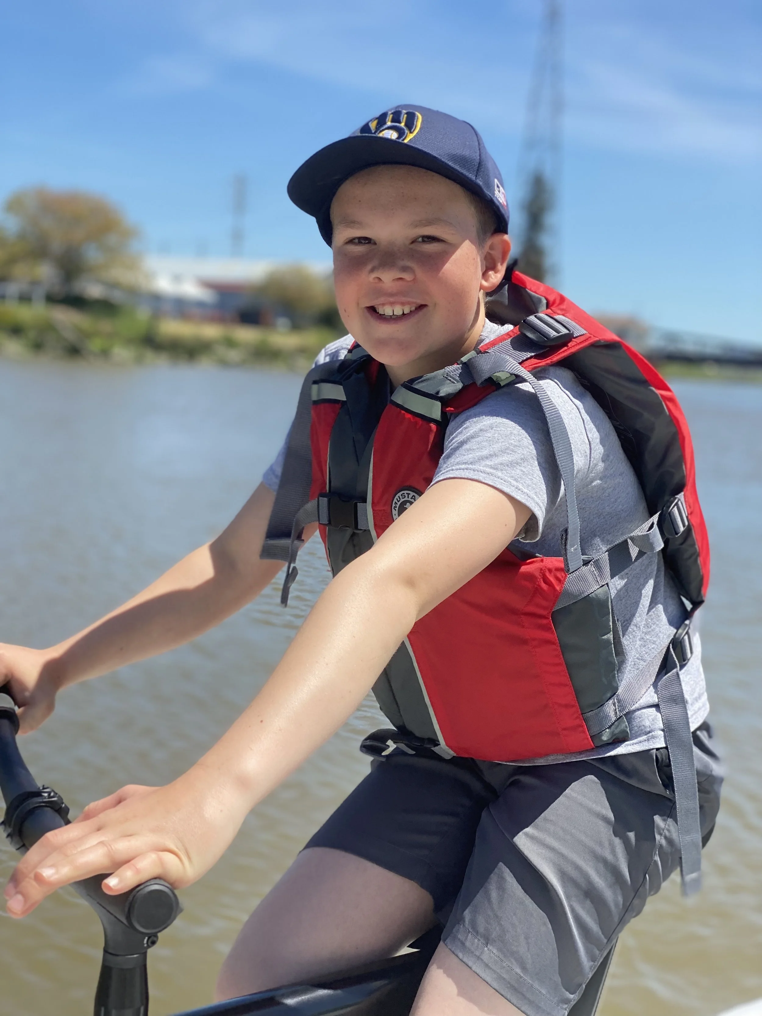 Eliot on Schiller Water Bike for summer camp page.jpg
