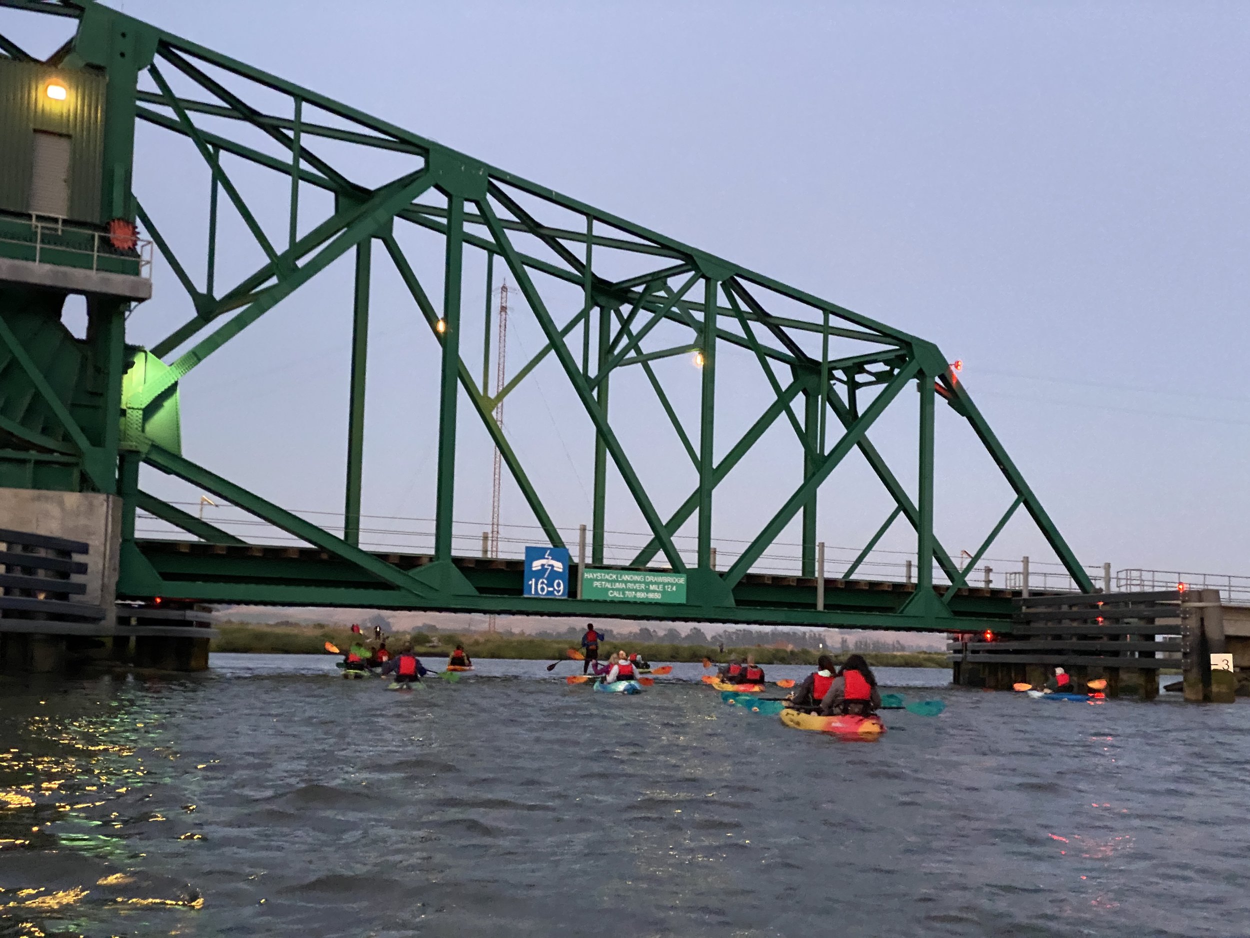 Floathouse Full Moon Paddlers head toward SMART RR bridge, Haystack Landing. (2024)
