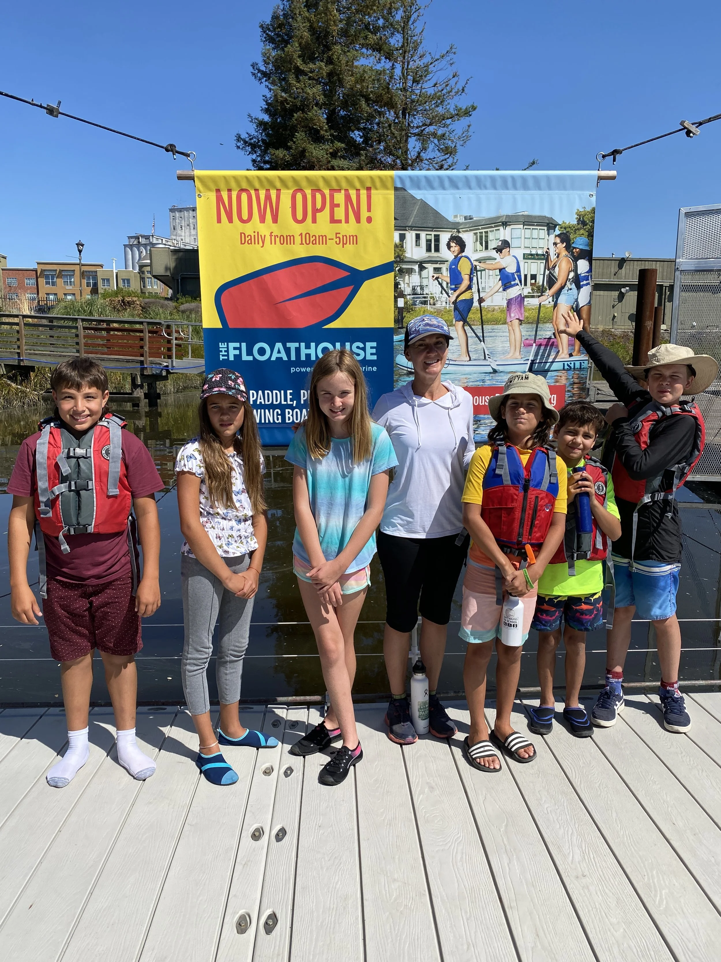 Campers in front of sign with Kristine 2 2023.JPG