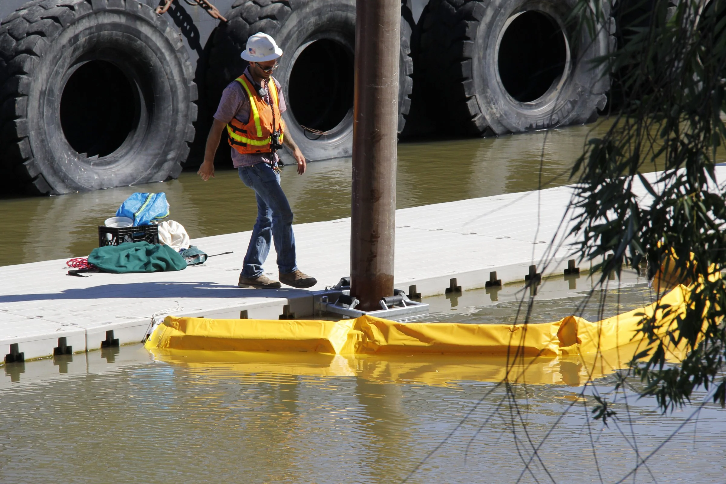Pilings for The Floathouse Petaluma are driven into the bedrock below the mud in the Petaluma River Turning Basin. (2022)