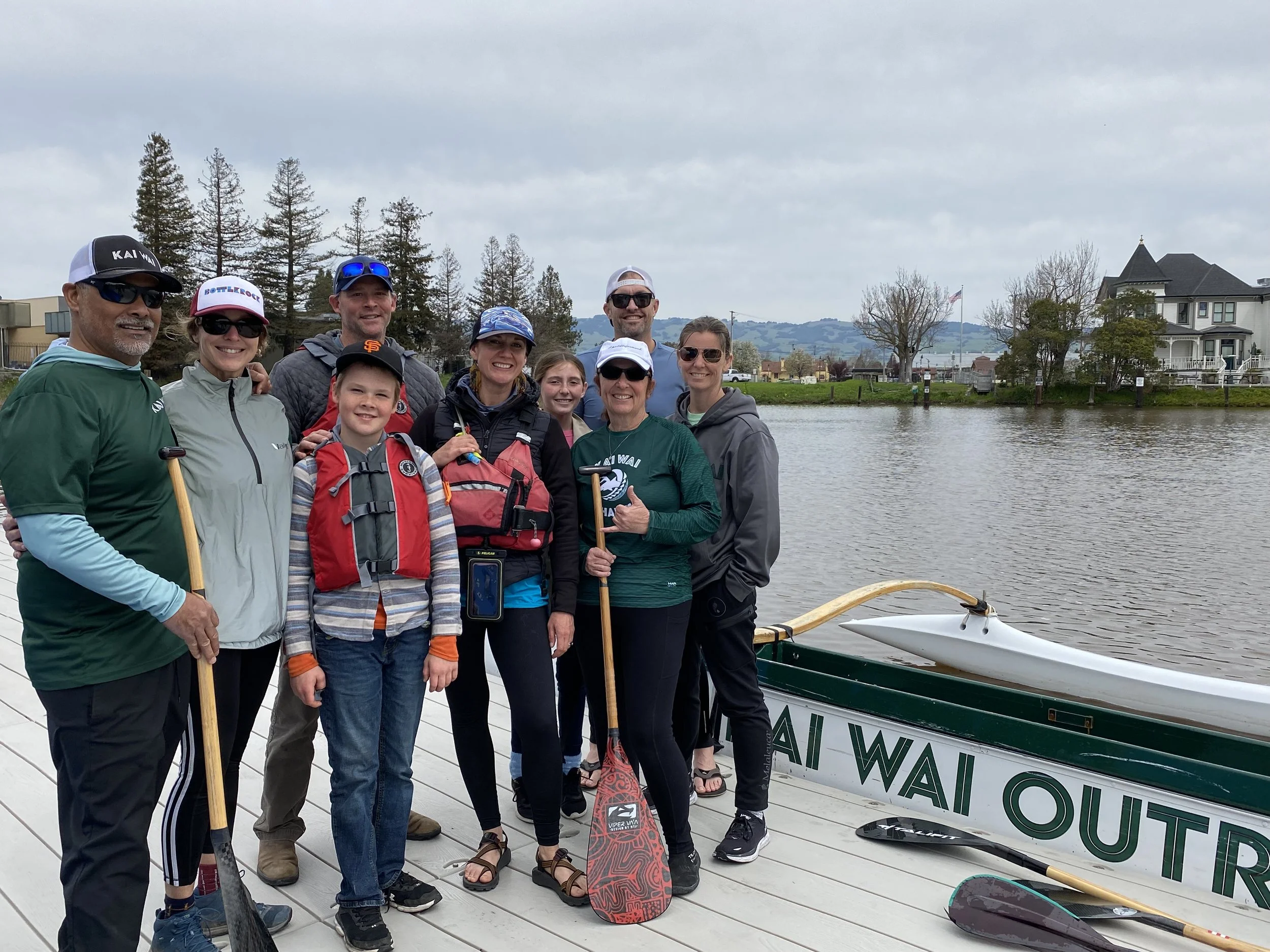 KaiWai Northbay members pose on The Floathouse dock after a demo day. KaiWai is one of three Hawaiian Outrigger Canoe clubs practicing on the Petaluma River year round. (2023)
