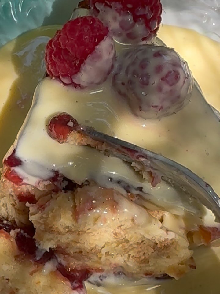 Citrus Bread Pudding with raspberries and vanilla cr&egrave;me Anglaise are my summer swoon.