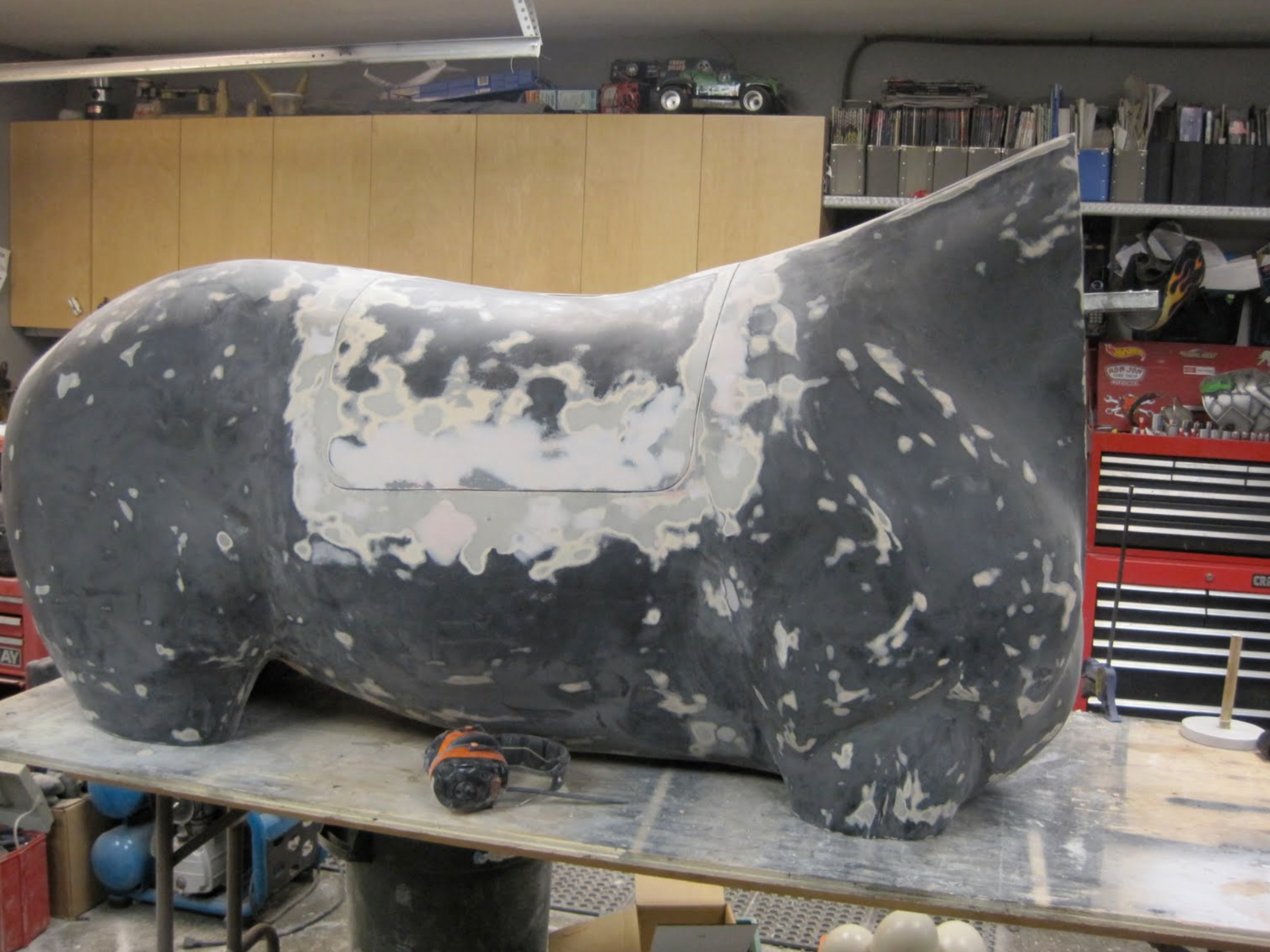  This photo shows the fiberglass horse with the access hatch cut into place. This will allow the instructors to place a real digestive tract into the unit to facilitate palpation. finished units will have a urethane tub to contain the organs, as well