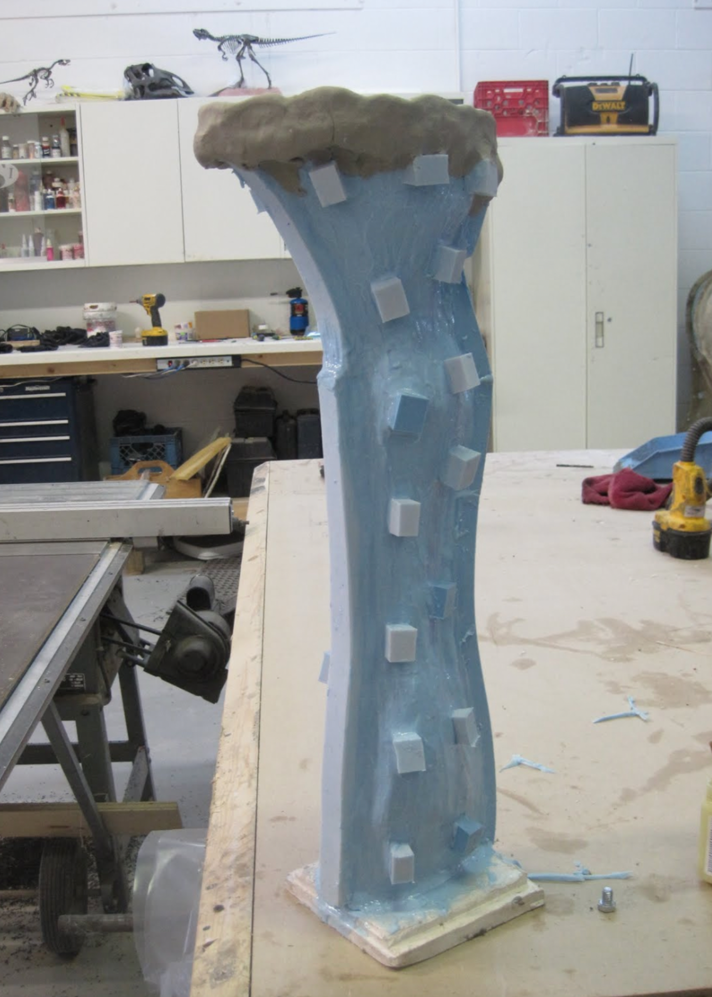  The equine leg mold now has the keys attached and is ready to have the bottom of the hoof poured. It then will have a fiberglass jacket applied, in three sections. then the mold of the leg exterior will be complete. 