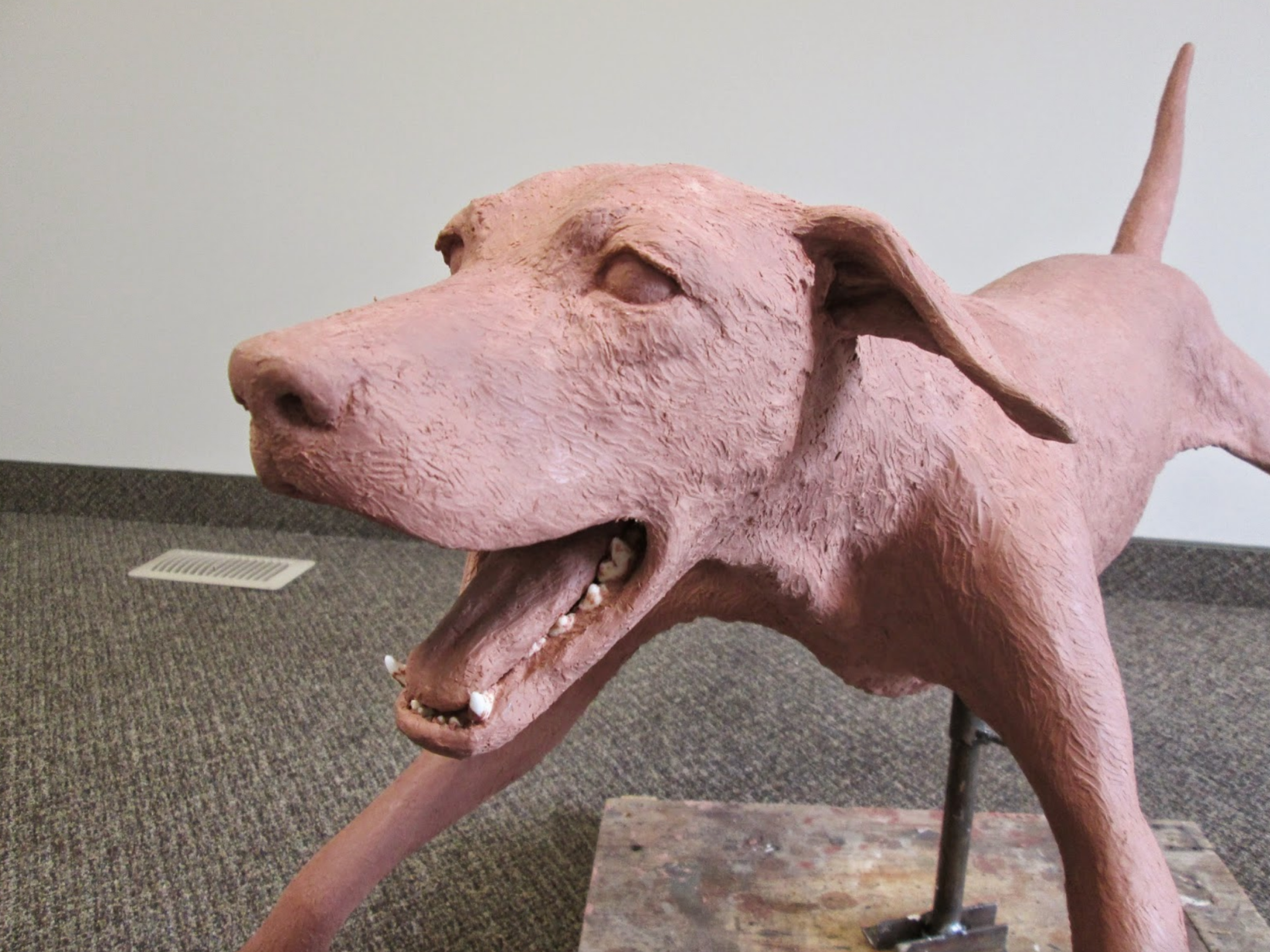  The actual canine skull and lower jaw were incorporated into the sculpture as well once again for accuracy. 