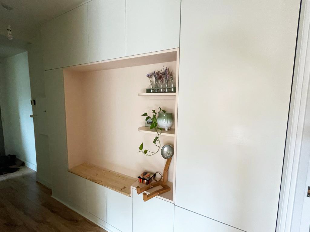 Handmade cupboards with a built in bench.